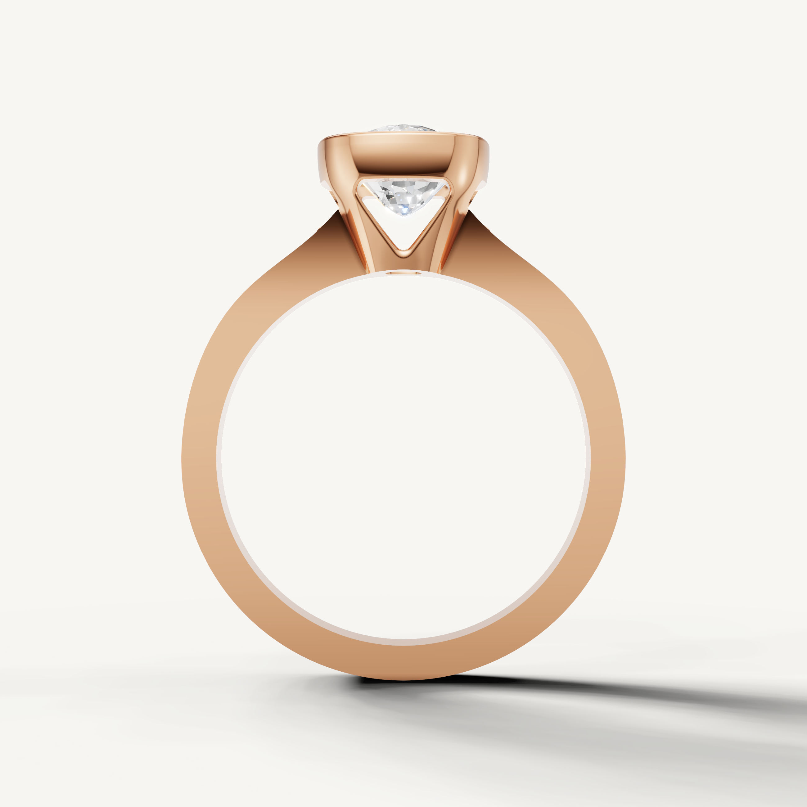Brilliant Seo rose gold bezel set cushion diamond ring by Raul Diamonds.