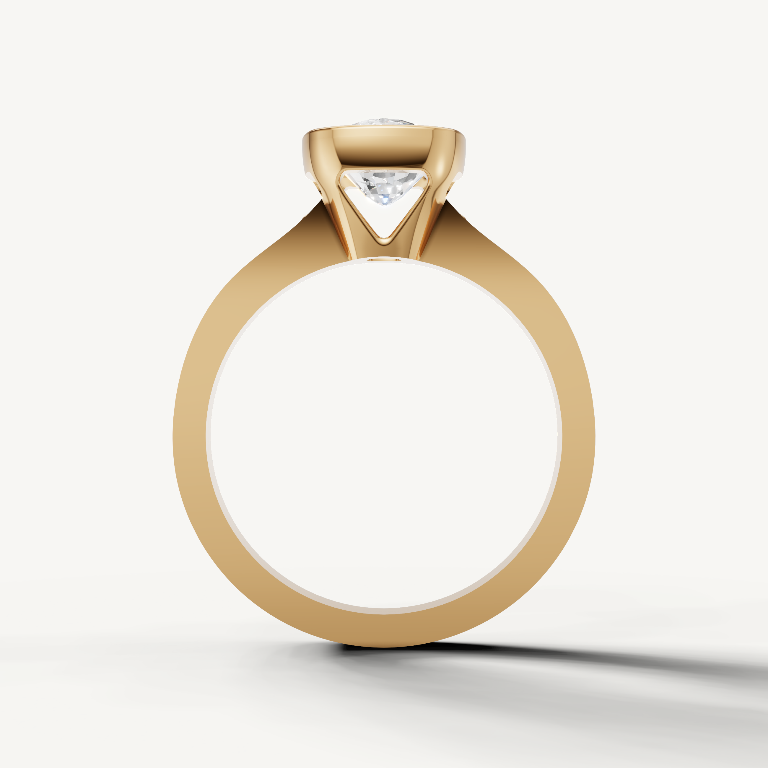 Close-up of Seo yellow gold cushion diamond engagement ring with pavé detailing by Raul Diamonds.