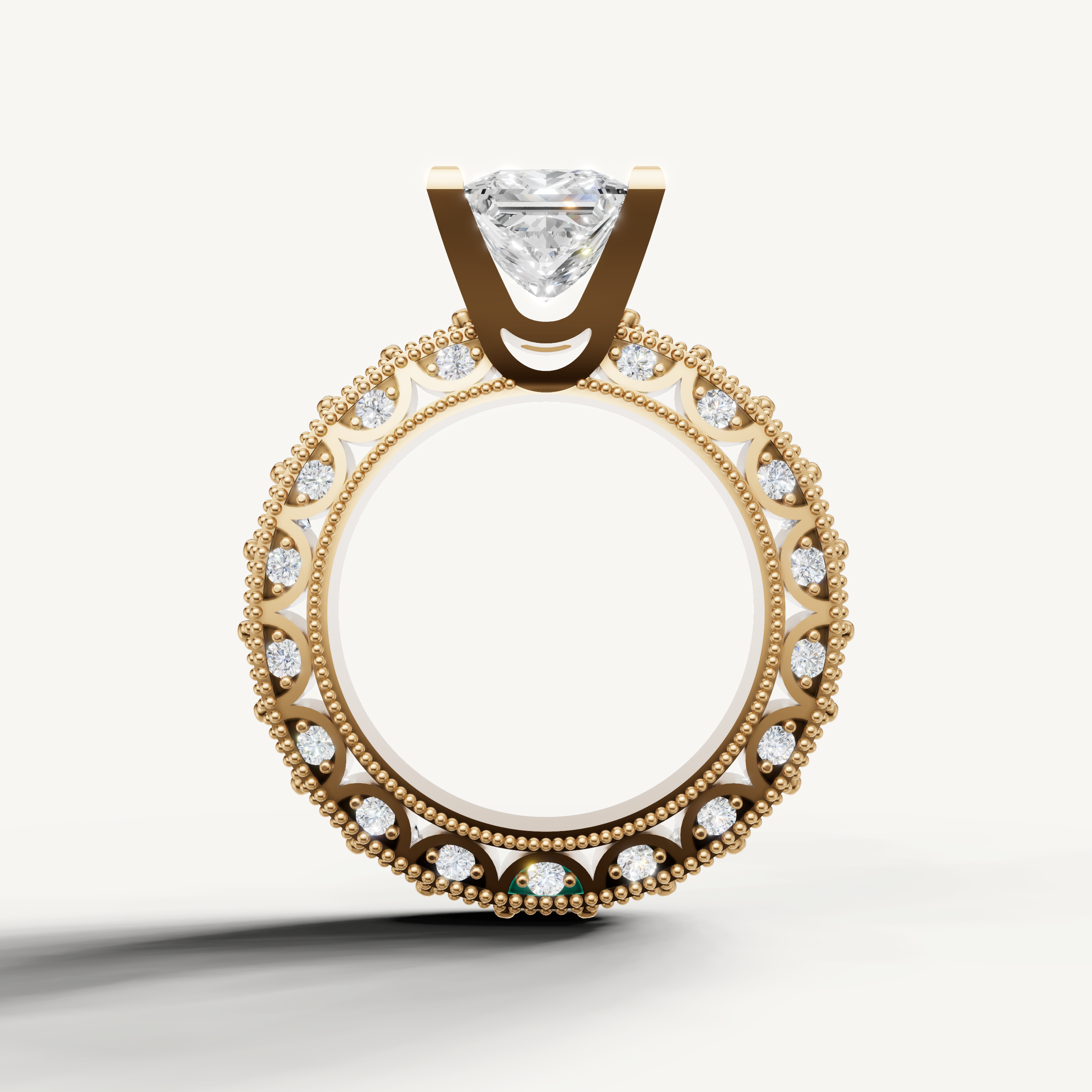 Close-up of Seo yellow gold princess diamond ring with milgrain band by Raul Diamonds.