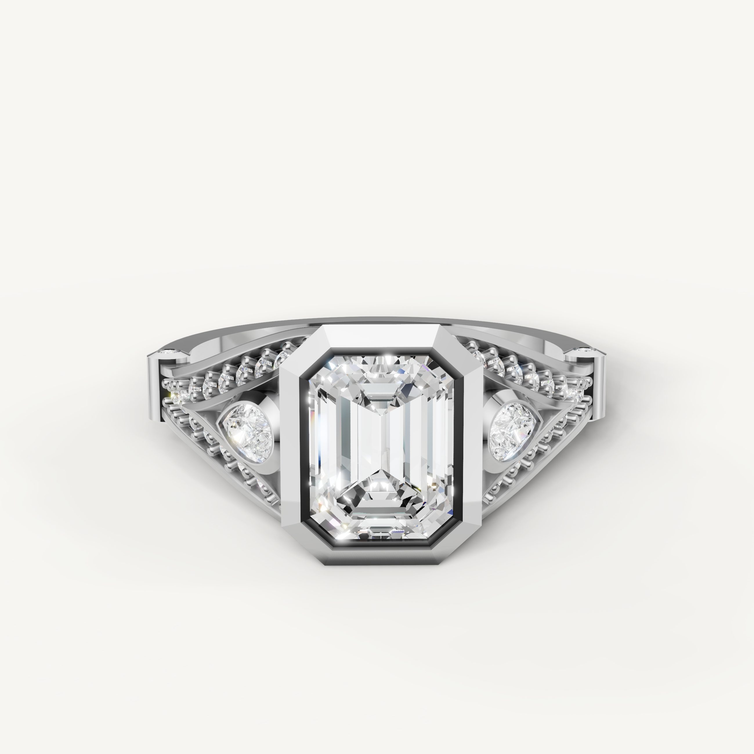 Seo white gold emerald cut ring with polished bezel setting from Raul Diamonds.