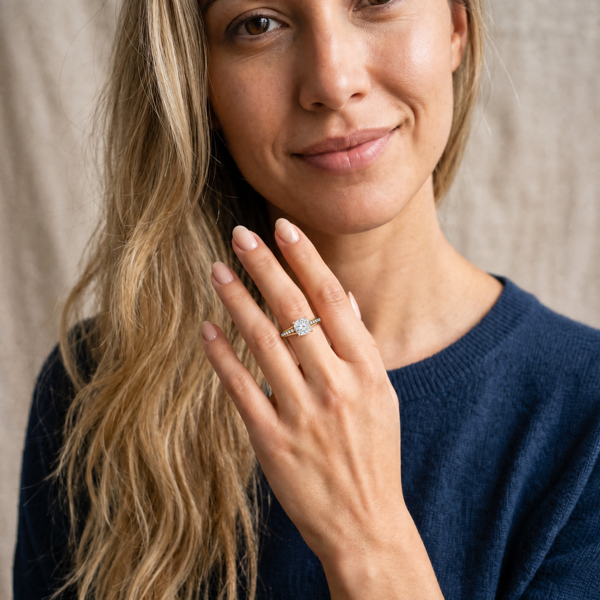 Elegant Model Wearing Cushion Cut Lab Grown Diamond Engagement Ring in 14K Yellow Gold – Raul Diamonds