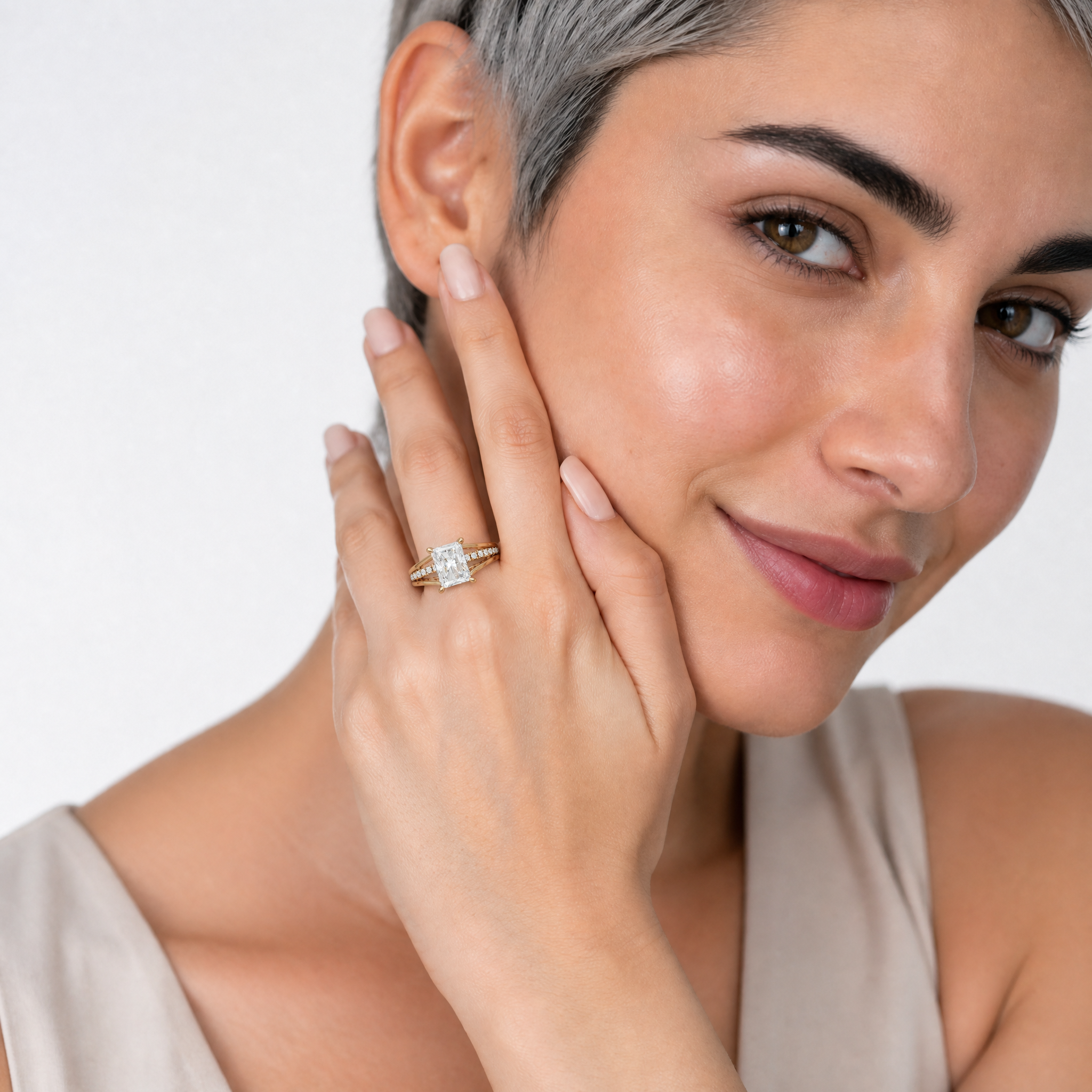 Elegant Model Wearing Radiant Cut Lab Grown Diamond Engagement Ring in 14K Yellow Gold – Raul Diamonds