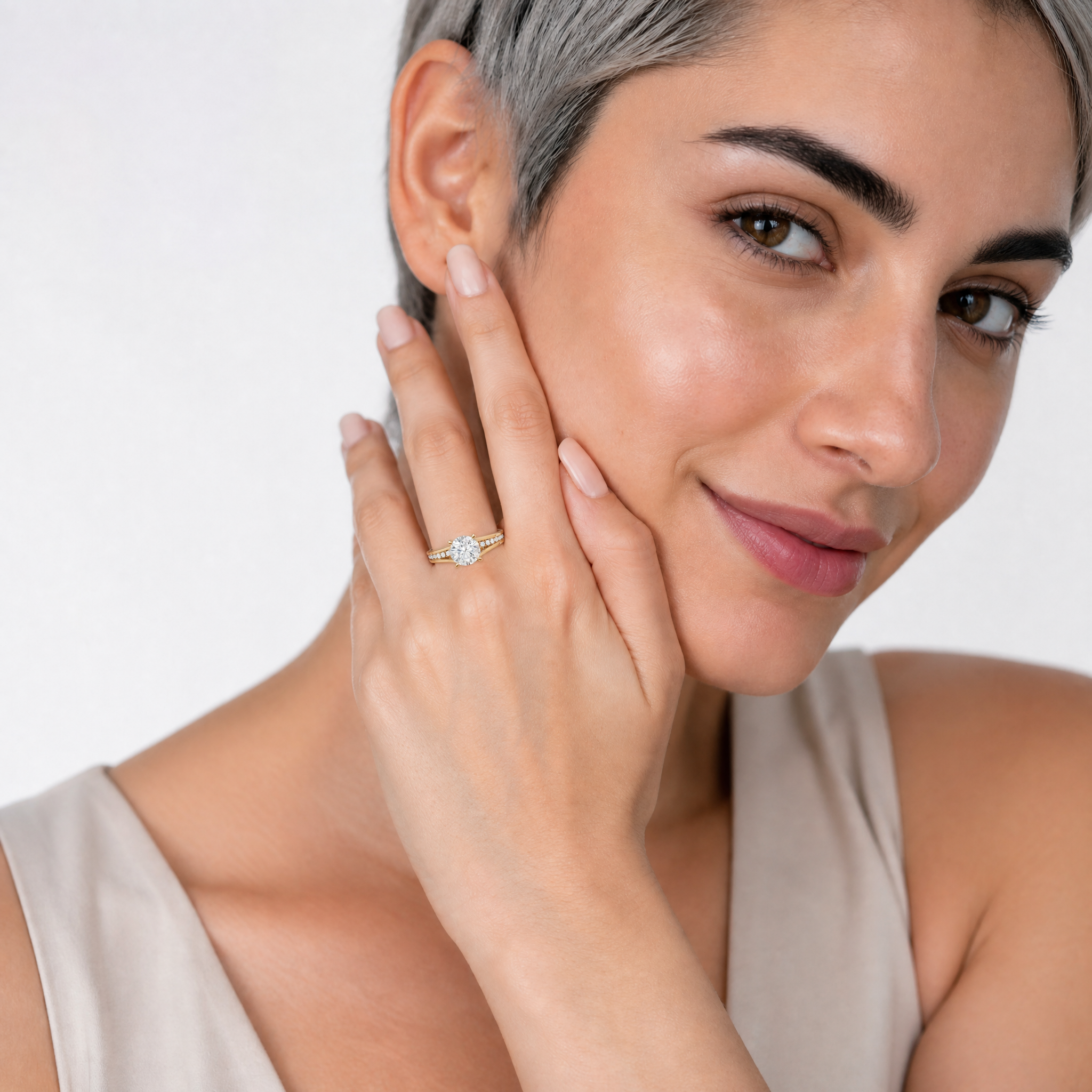 Elegant Model Wearing Round Cut Lab Grown Diamond Engagement Ring in 14K Yellow Gold – Raul Diamonds