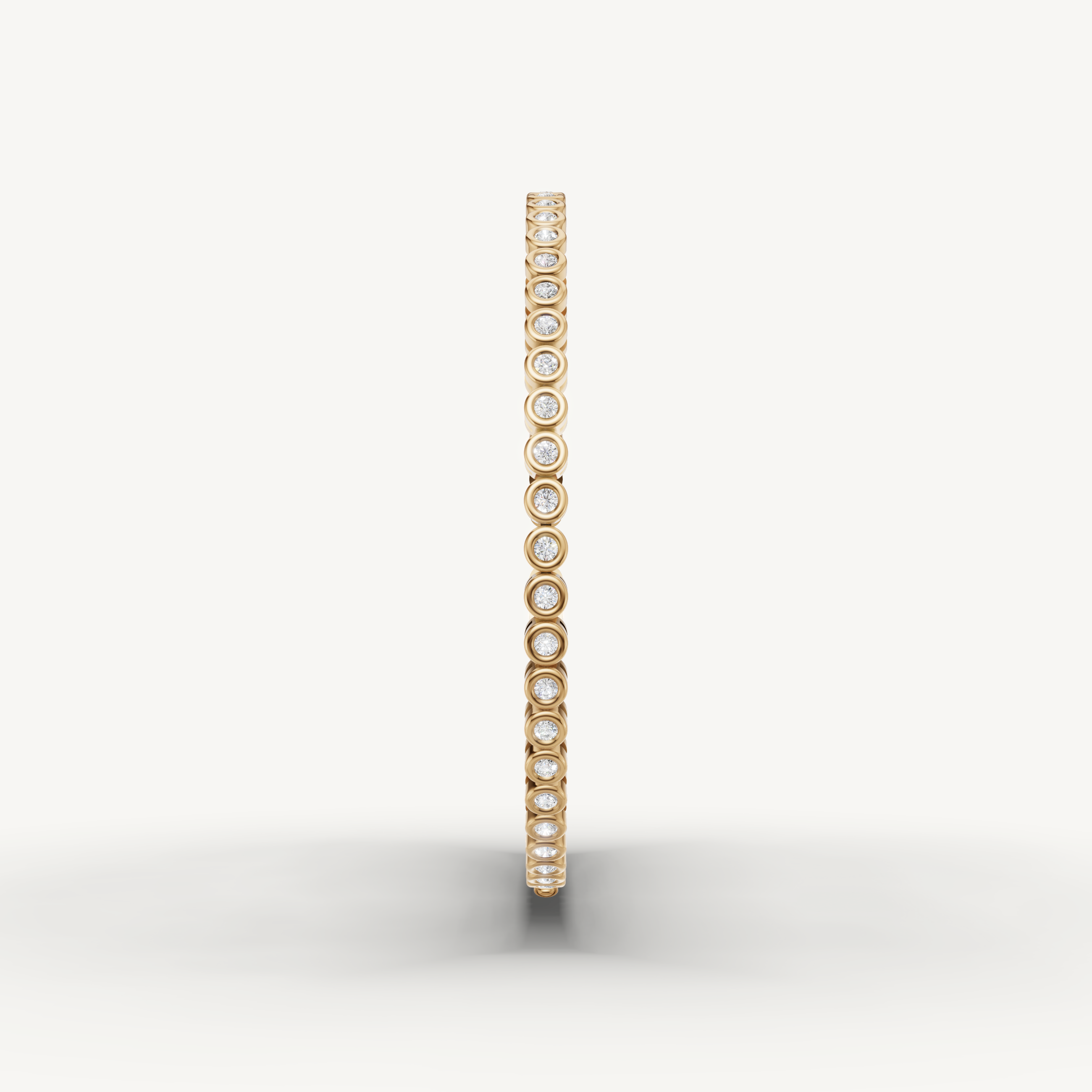 Luxury yellow gold diamond bracelet featuring round bezel set lab grown diamonds by Raul Diamonds