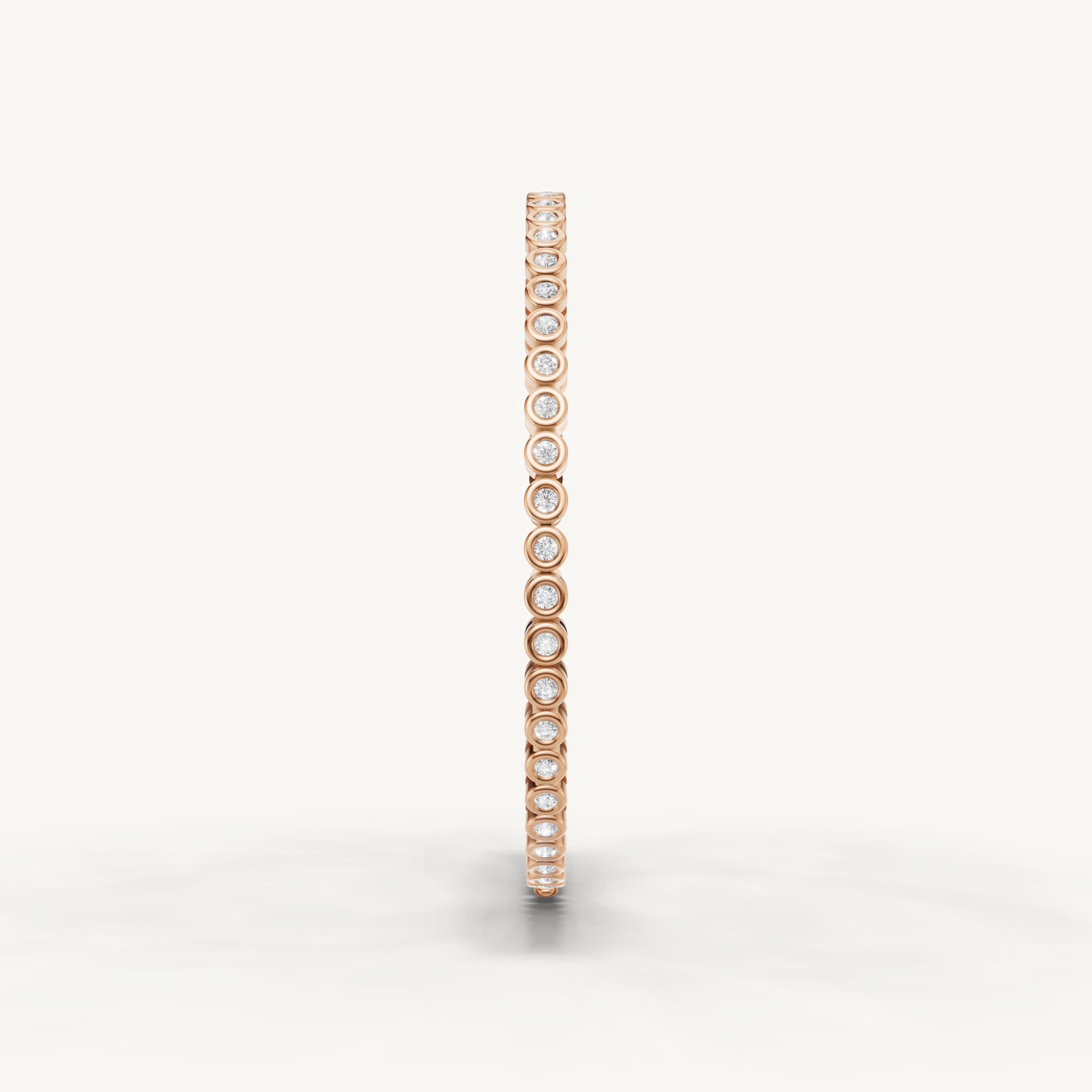 Luxury rose gold diamond bracelet featuring sparkling round bezel diamonds by Raul Diamonds