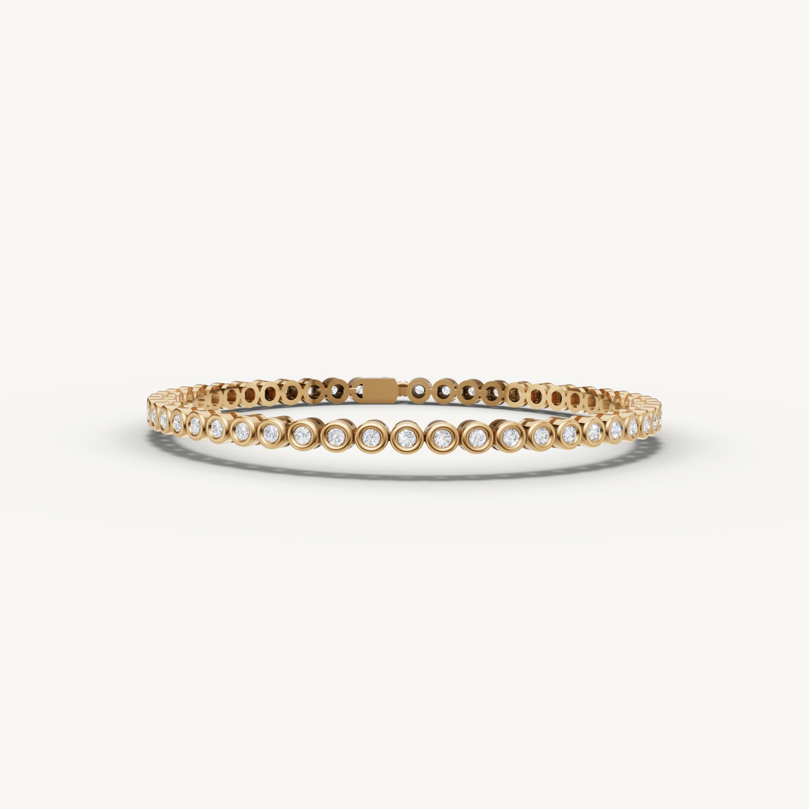 Yellow gold bezel set lab grown diamond tennis bracelet with timeless elegance by Raul Diamonds