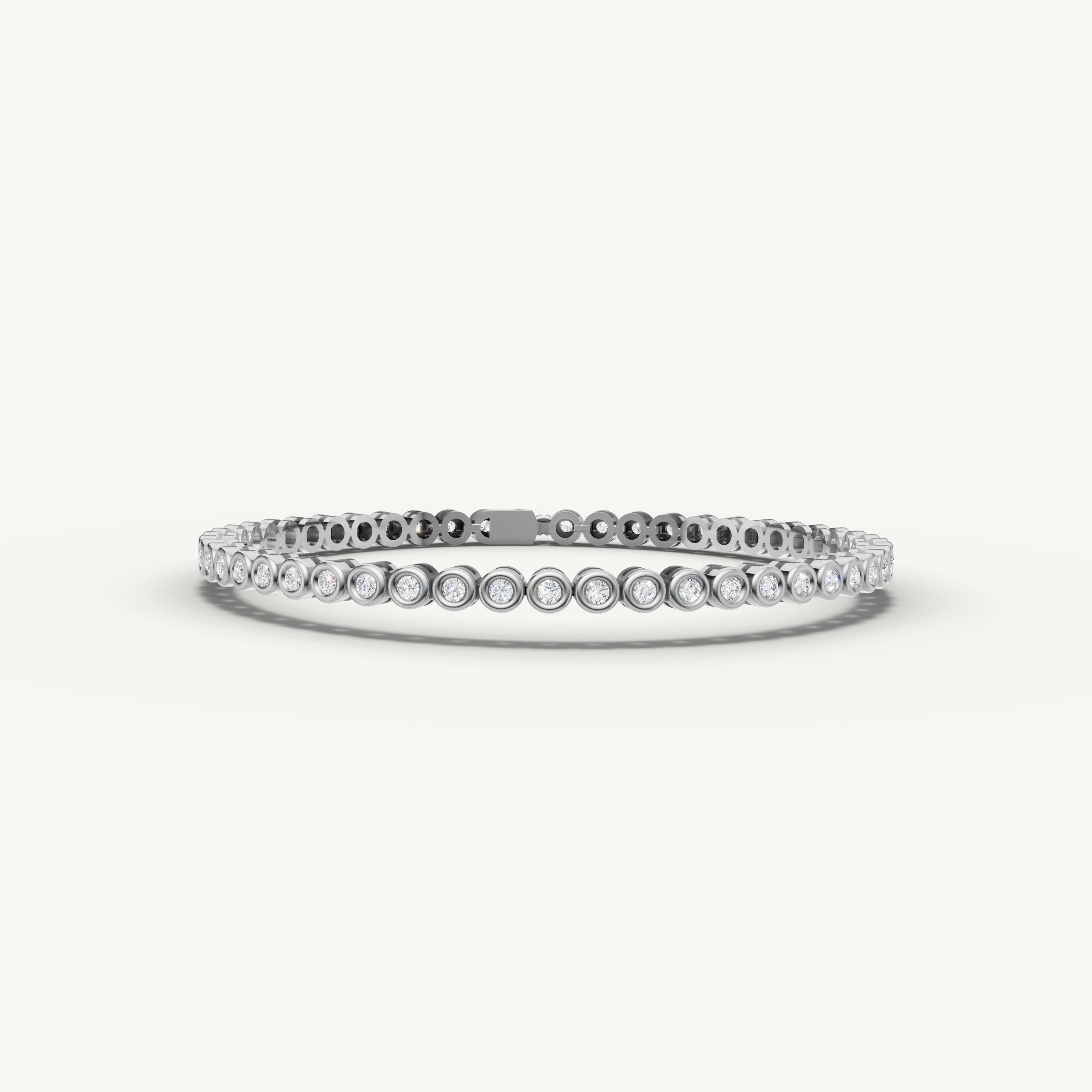 White gold bezel set lab grown diamond tennis bracelet with elegant sparkle by Raul Diamonds