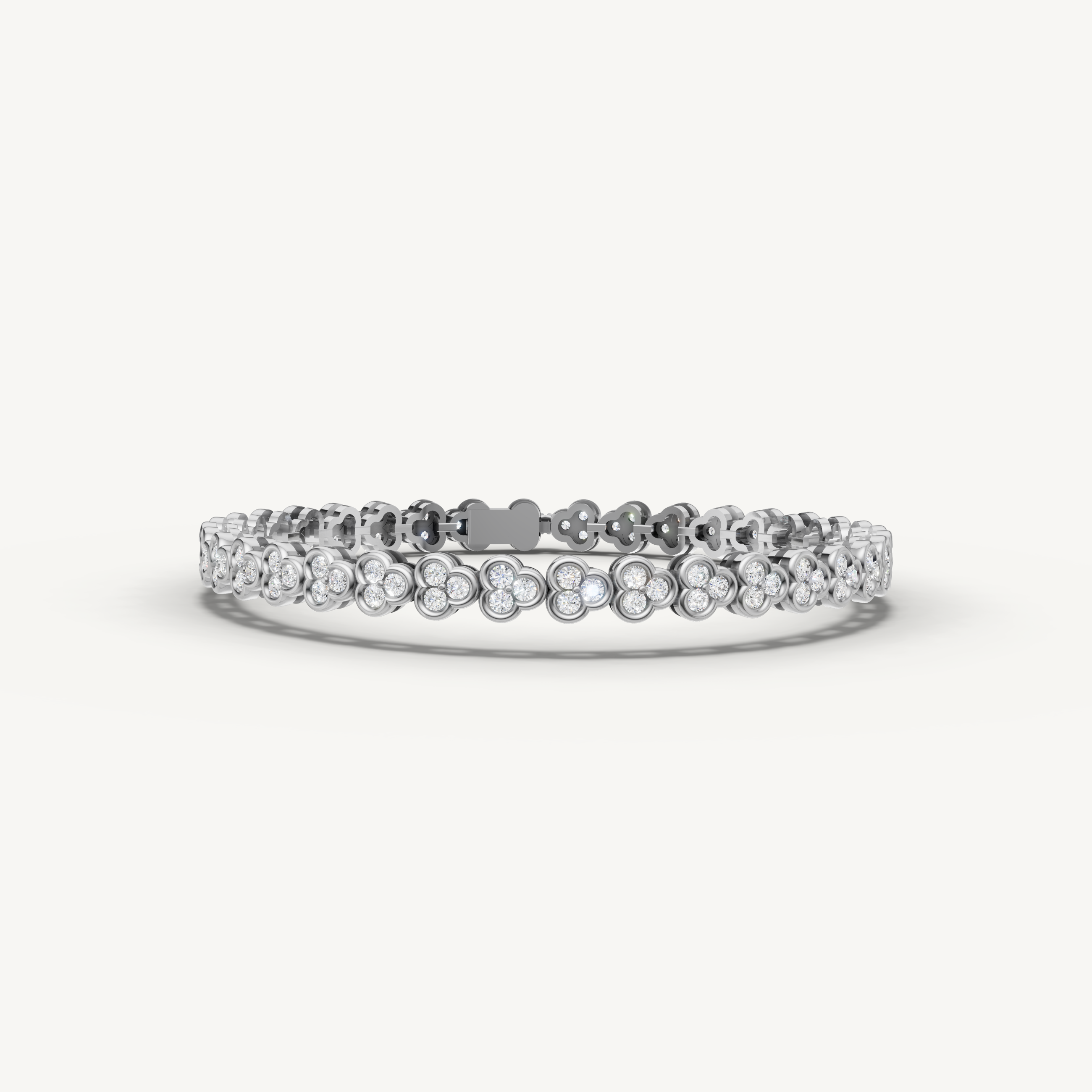 Luxury white gold diamond bracelet featuring clover inspired diamond motifs by Raul Diamonds