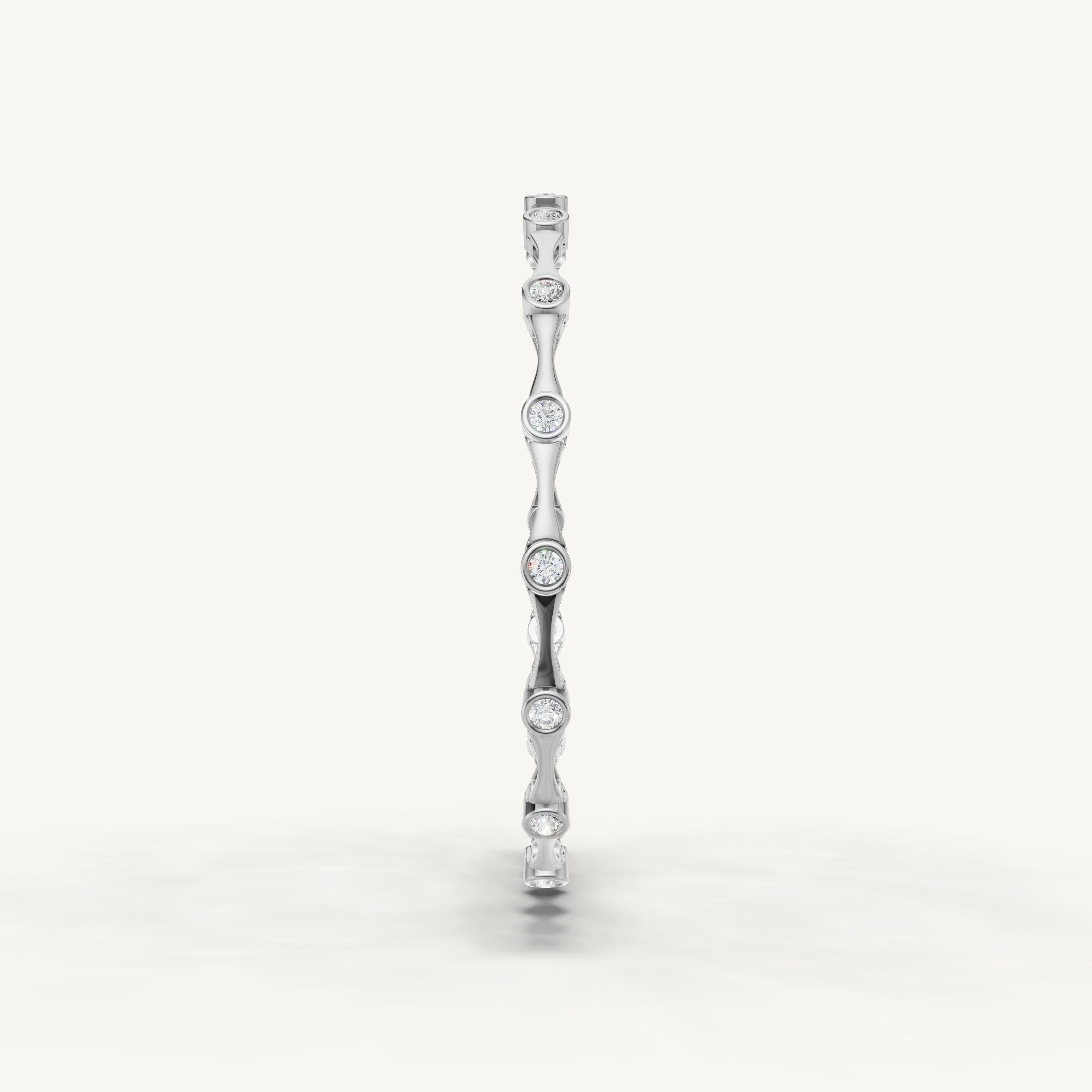 Elegant white gold diamond bracelet featuring brilliant bezel set stones by Raul Diamonds