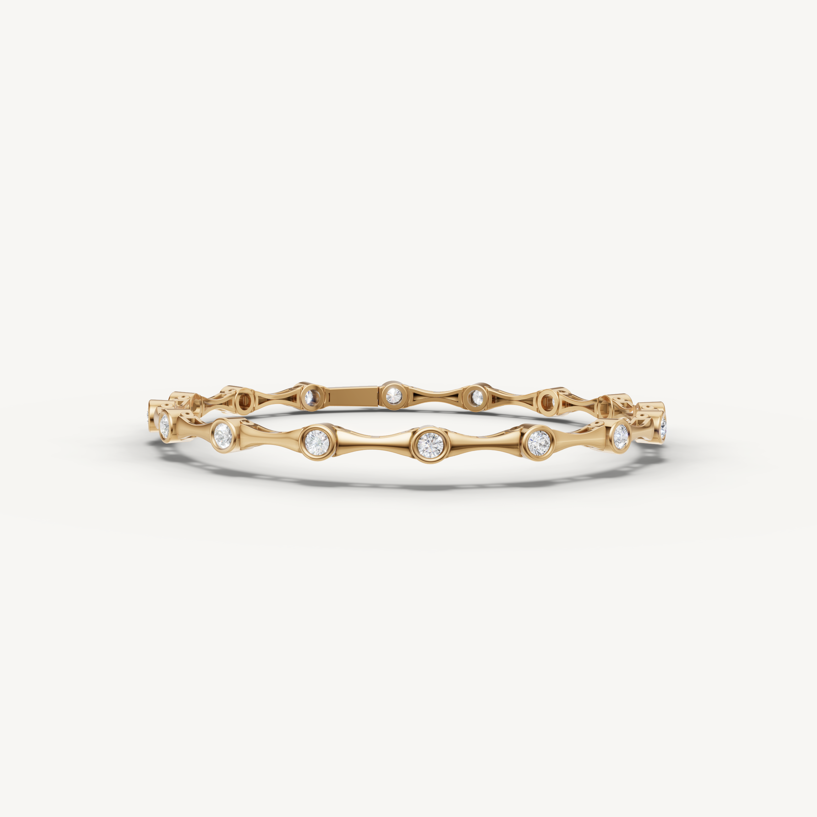 Yellow gold bezel set lab grown diamond tennis bracelet with flowing modern design by Raul Diamonds