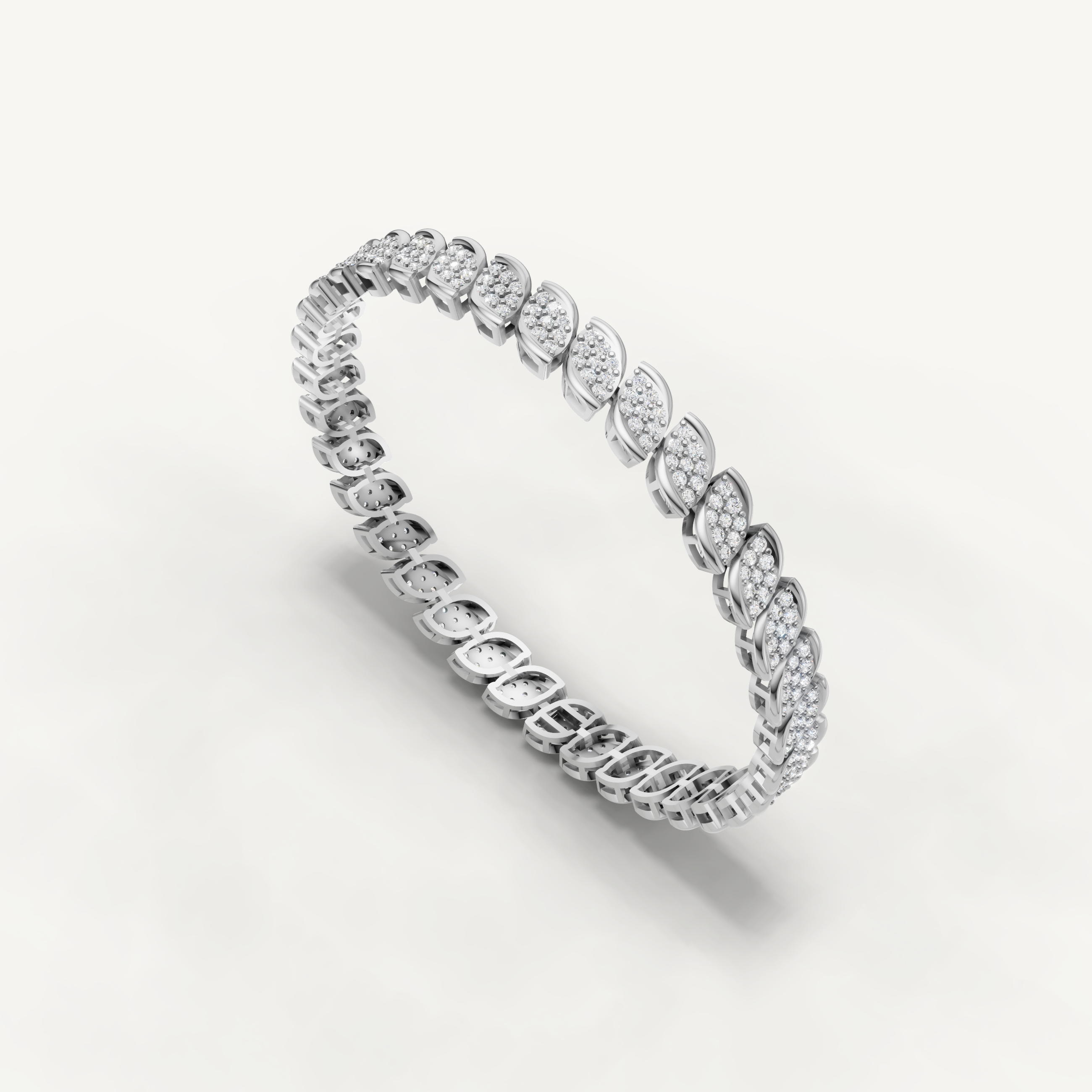 Elegant white gold diamond bracelet with modern leaf inspired styling by Raul Diamonds