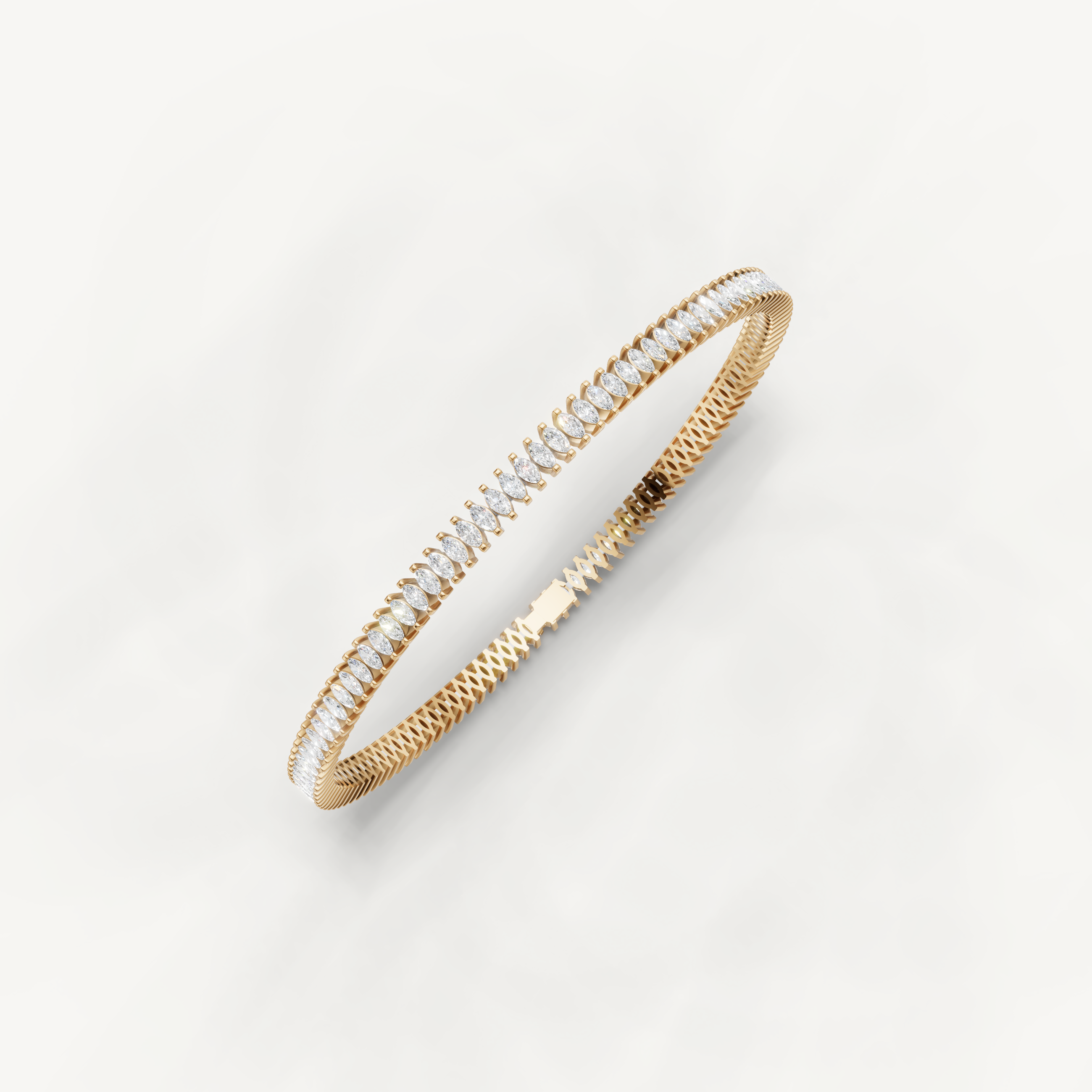 Yellow gold fine jewelry tennis bracelet with brilliant marquise diamond detailing by Raul Diamonds