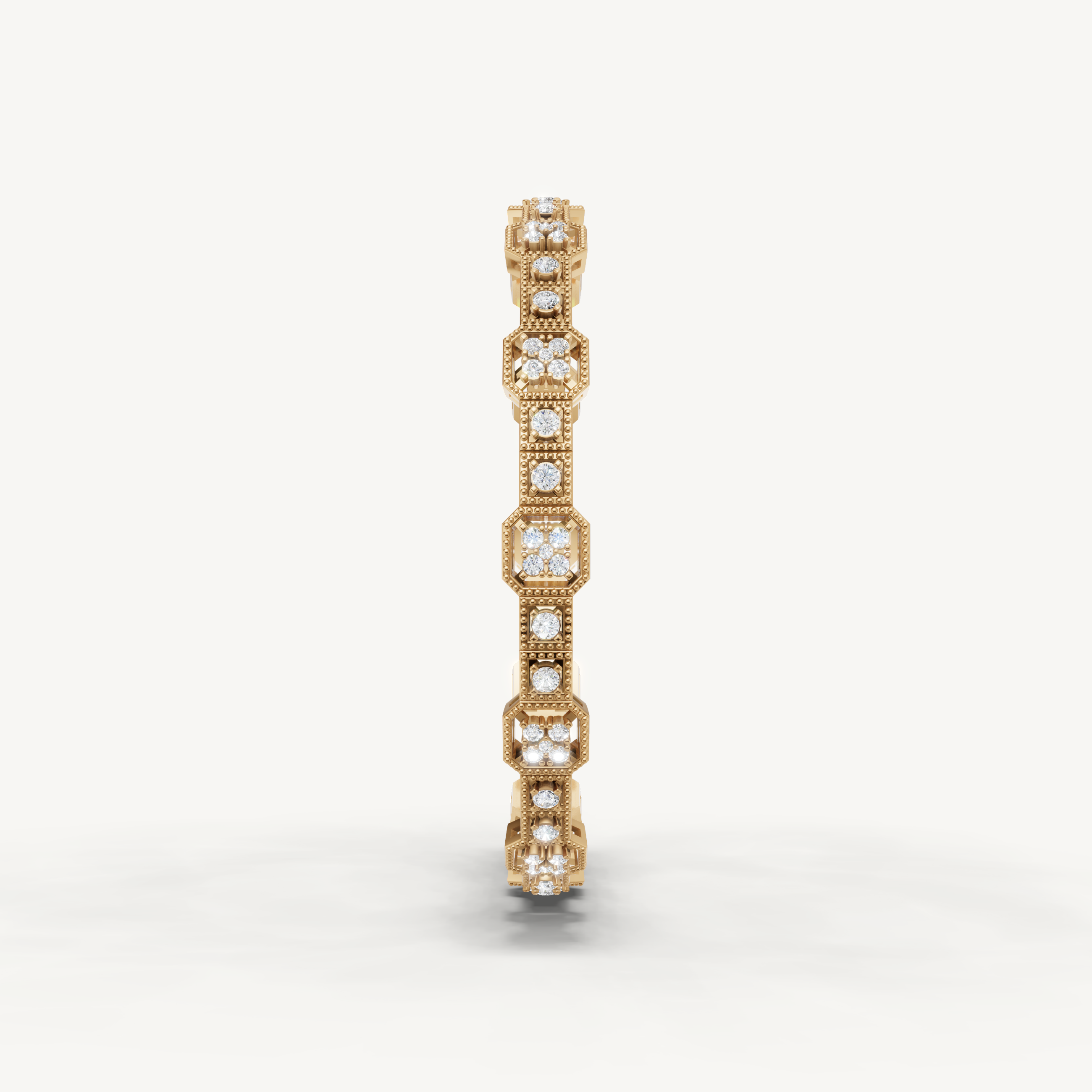 Luxury yellow gold diamond bracelet featuring octagon halo detailing by Raul Diamonds