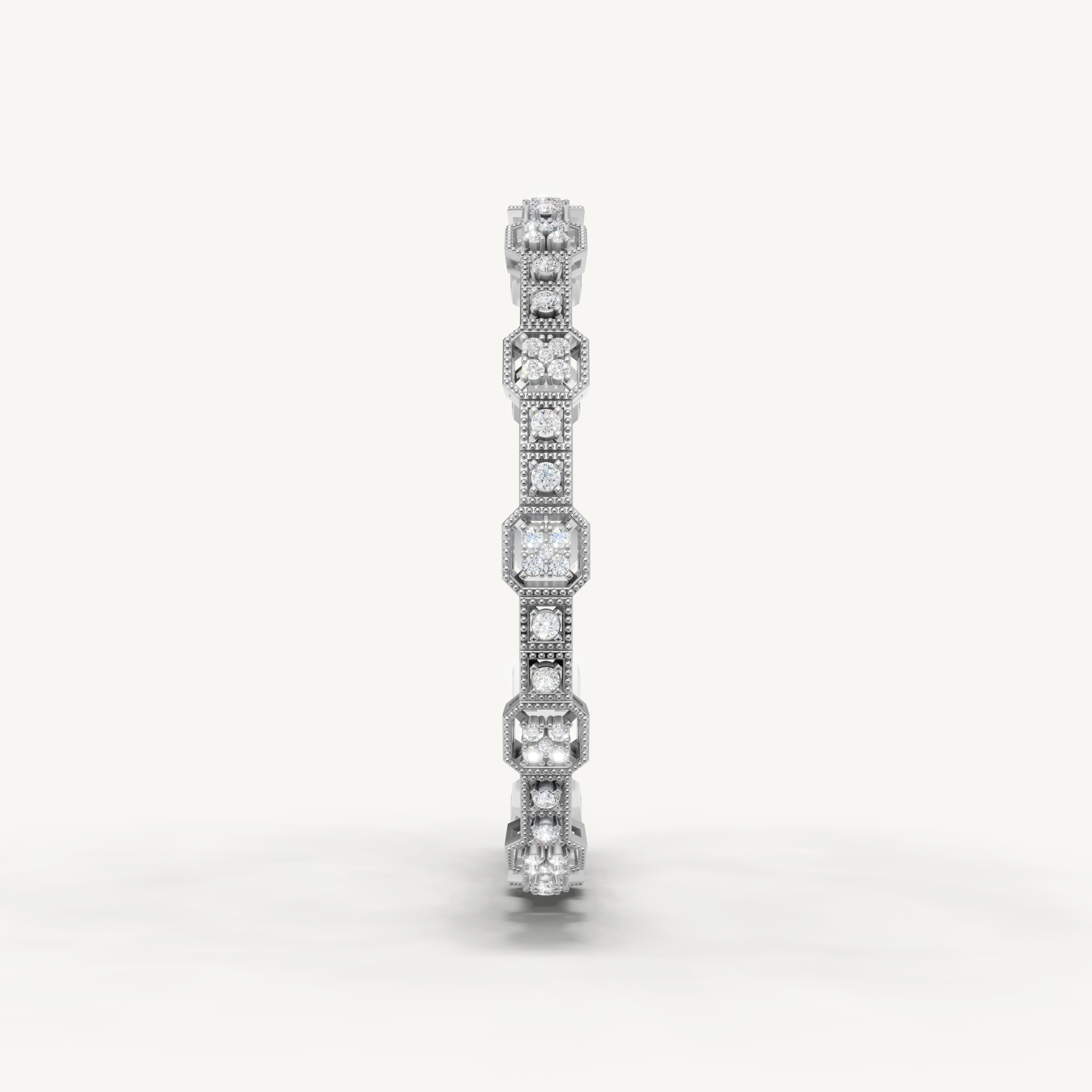 Luxury white gold diamond bracelet featuring octagon halo diamond accents by Raul Diamonds