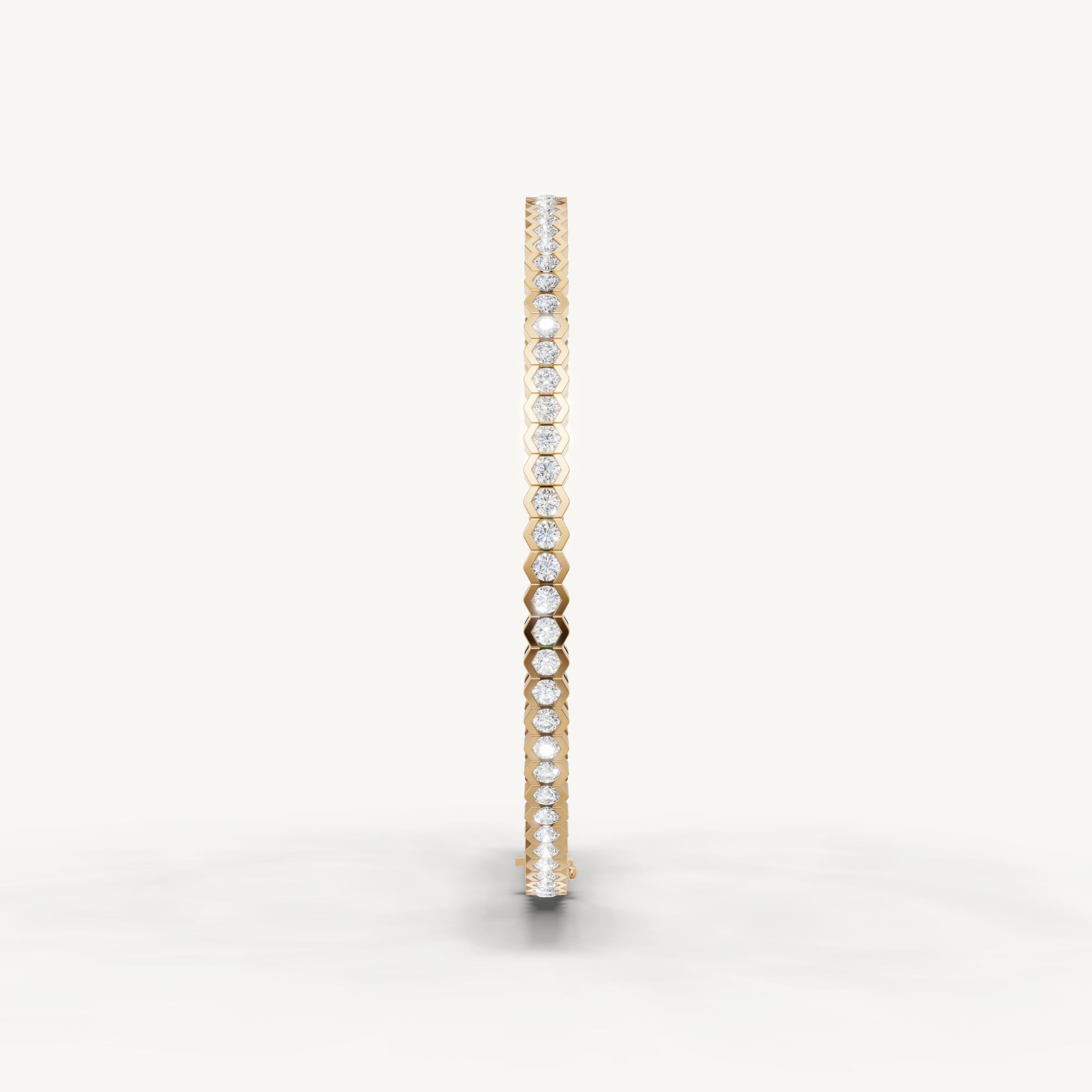 Luxury yellow gold diamond bracelet with modern hexagon inspired design by Raul Diamonds