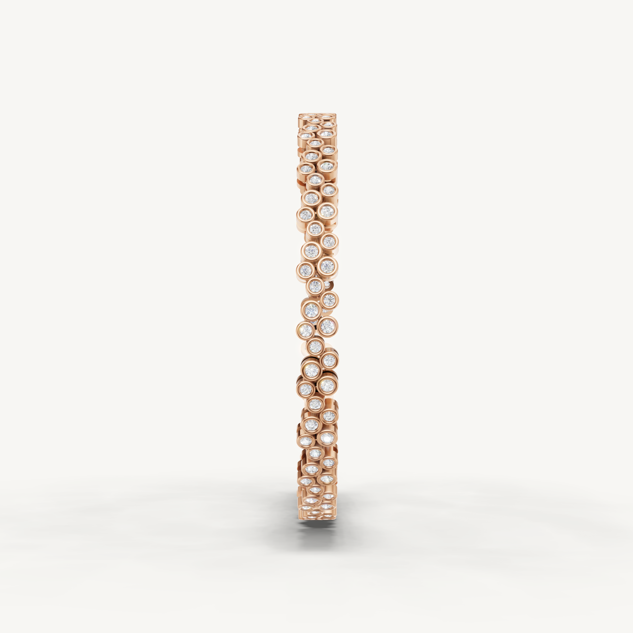 Luxury rose gold diamond bracelet with round bezel set diamond accents by Raul Diamonds