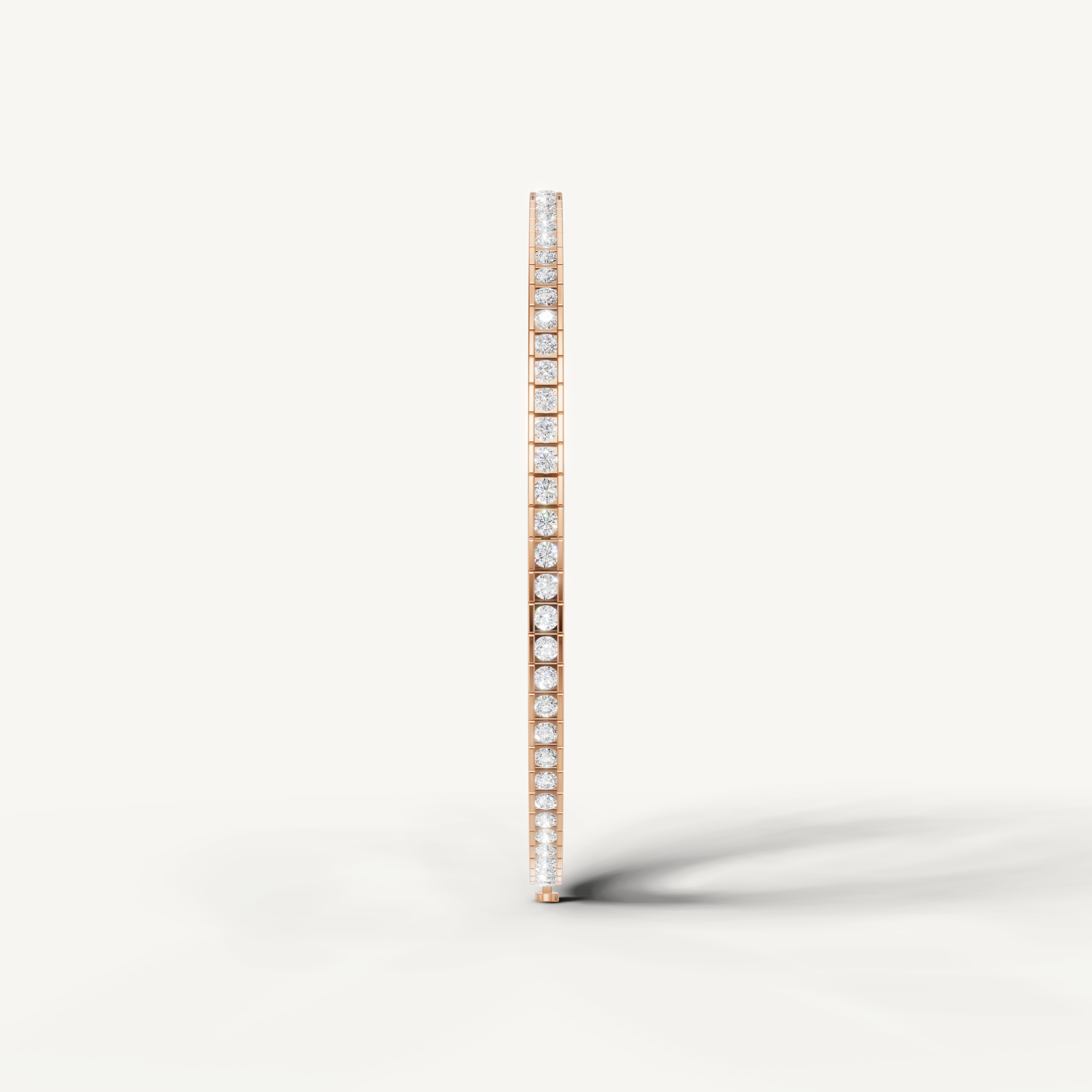 Luxury rose gold diamond bracelet featuring round bezel set diamonds by Raul Diamonds