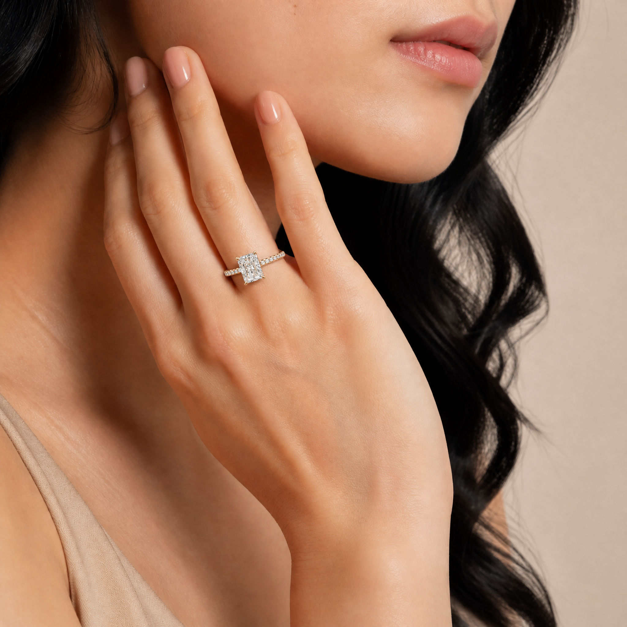 Luxury Model Wearing Radiant Cut Lab Grown Diamond Engagement Ring in 14K Yellow Gold – Raul Diamonds