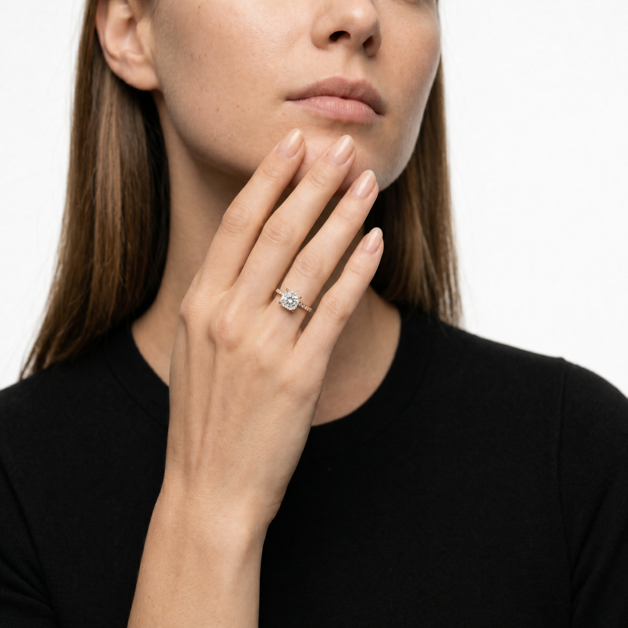 Elegant Woman Wearing Cushion Cut Lab Grown Diamond Engagement Ring in 14K Yellow Gold – Raul Diamonds