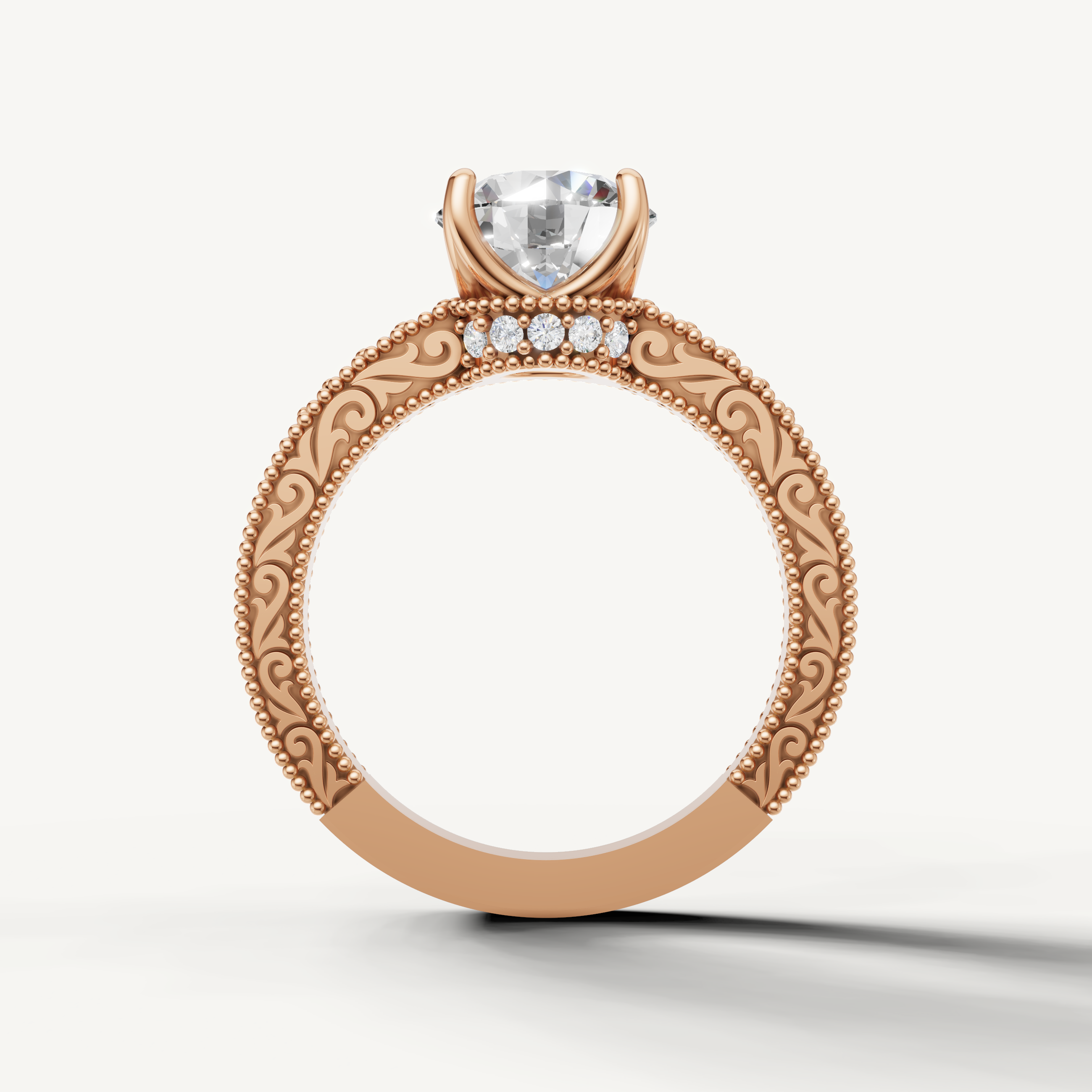 Round cut lab grown diamond engagement ring in rose gold with elegant vintage detailing and round accent diamonds by Raul Diamonds.