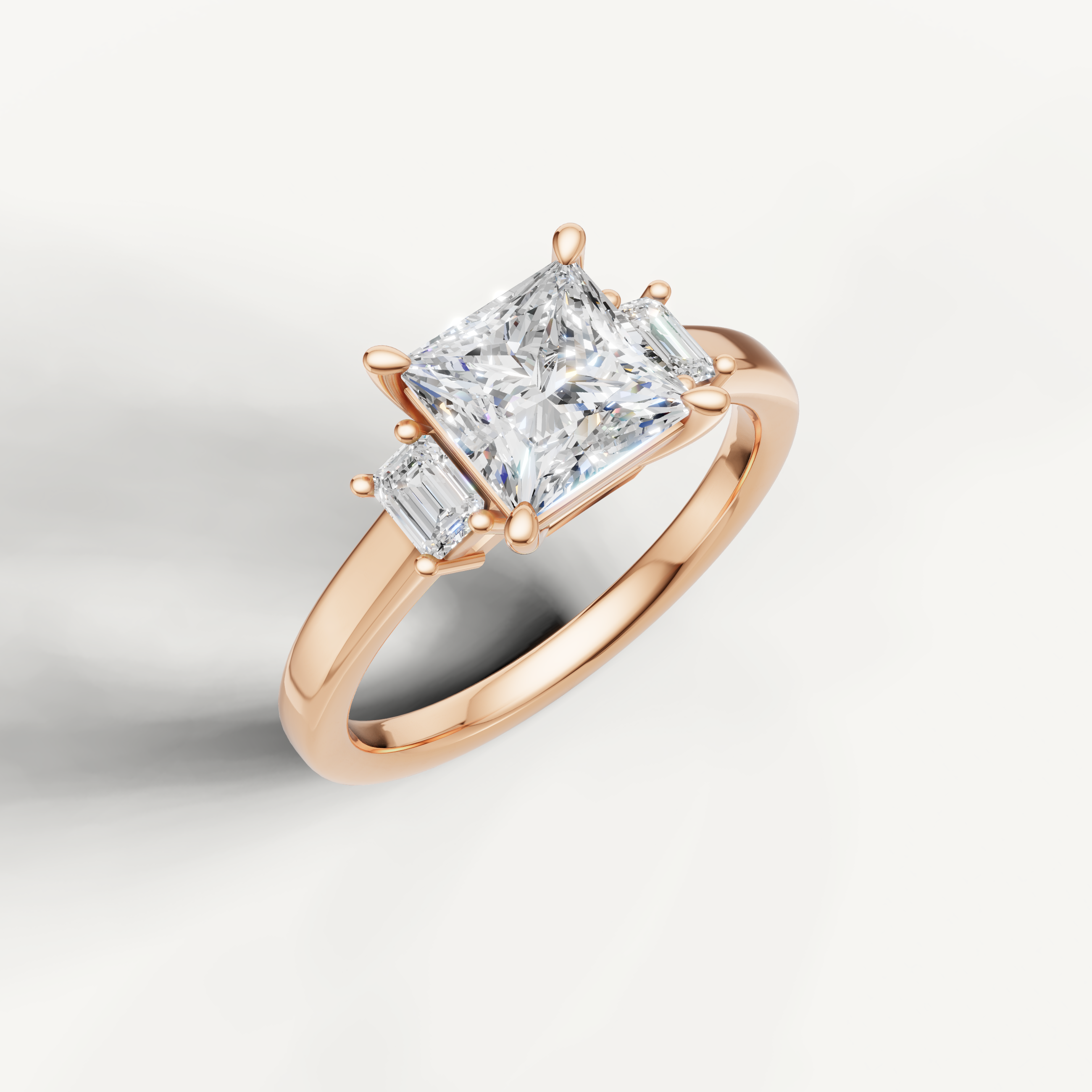 14K rose gold princess lab grown diamond ring with step cut side diamonds and sleek band