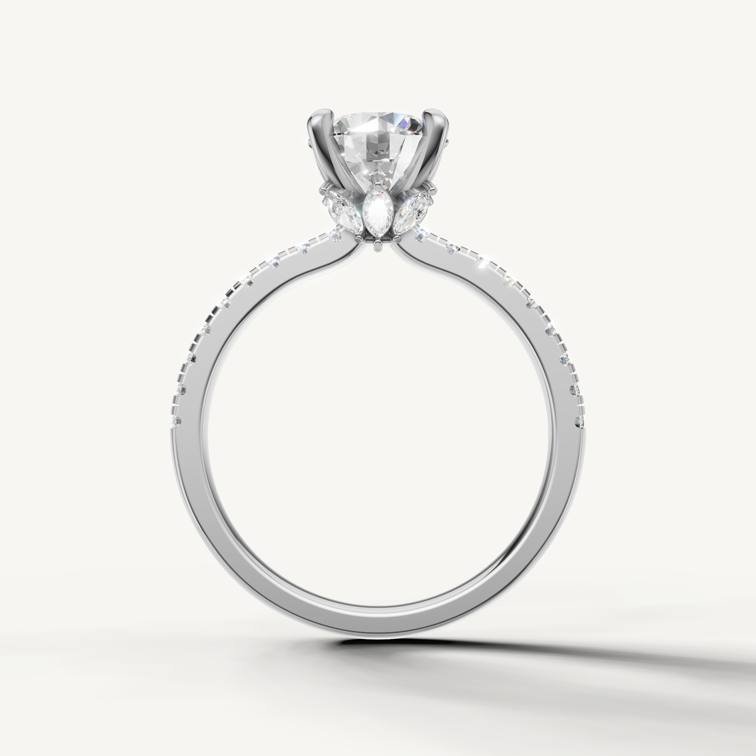 Luxury white gold round brilliant diamond wedding ring showcasing a brilliant center stone and continuous pavé detail.