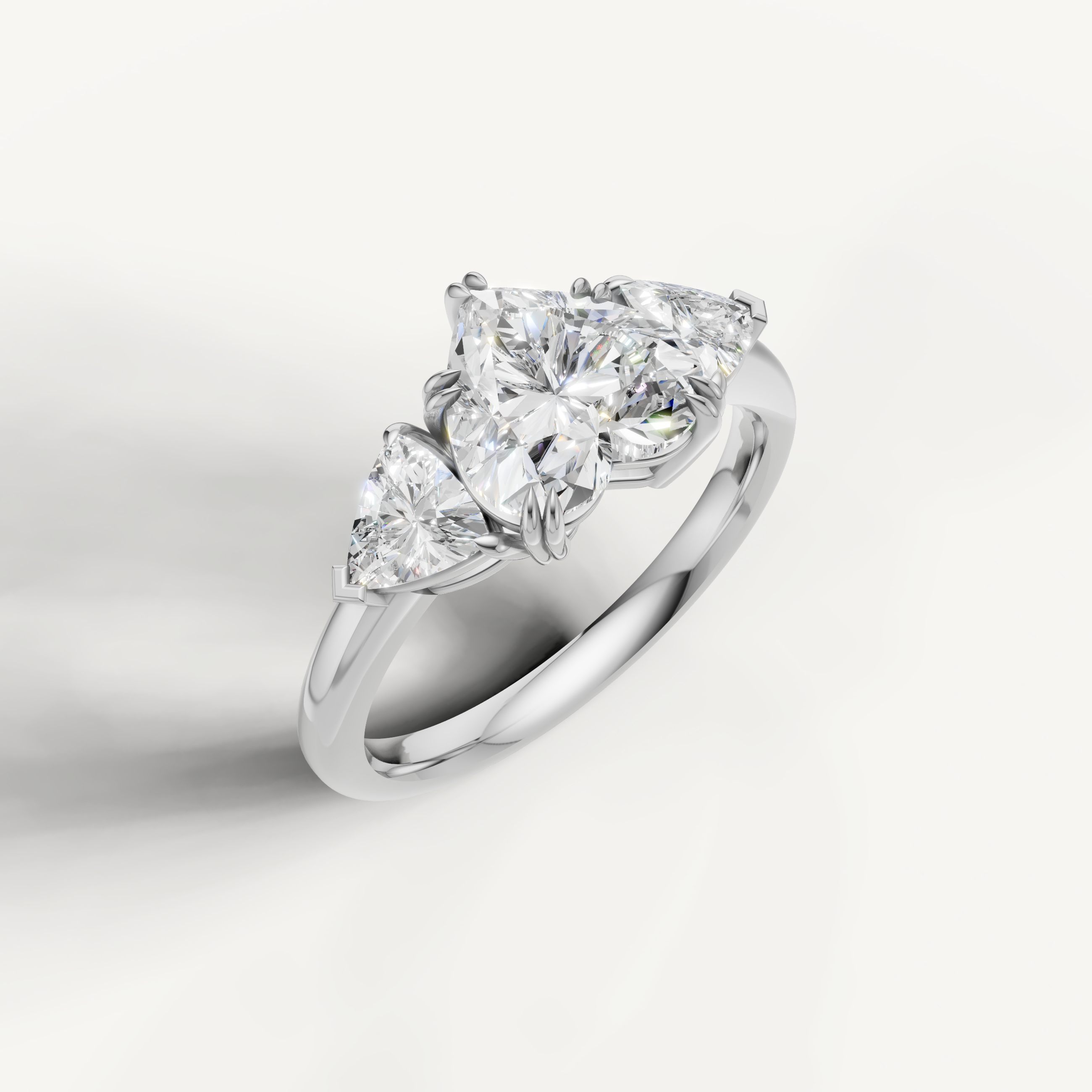 luxurious heart shaped lab grown diamond trilogy ring with brilliant trillion side accents