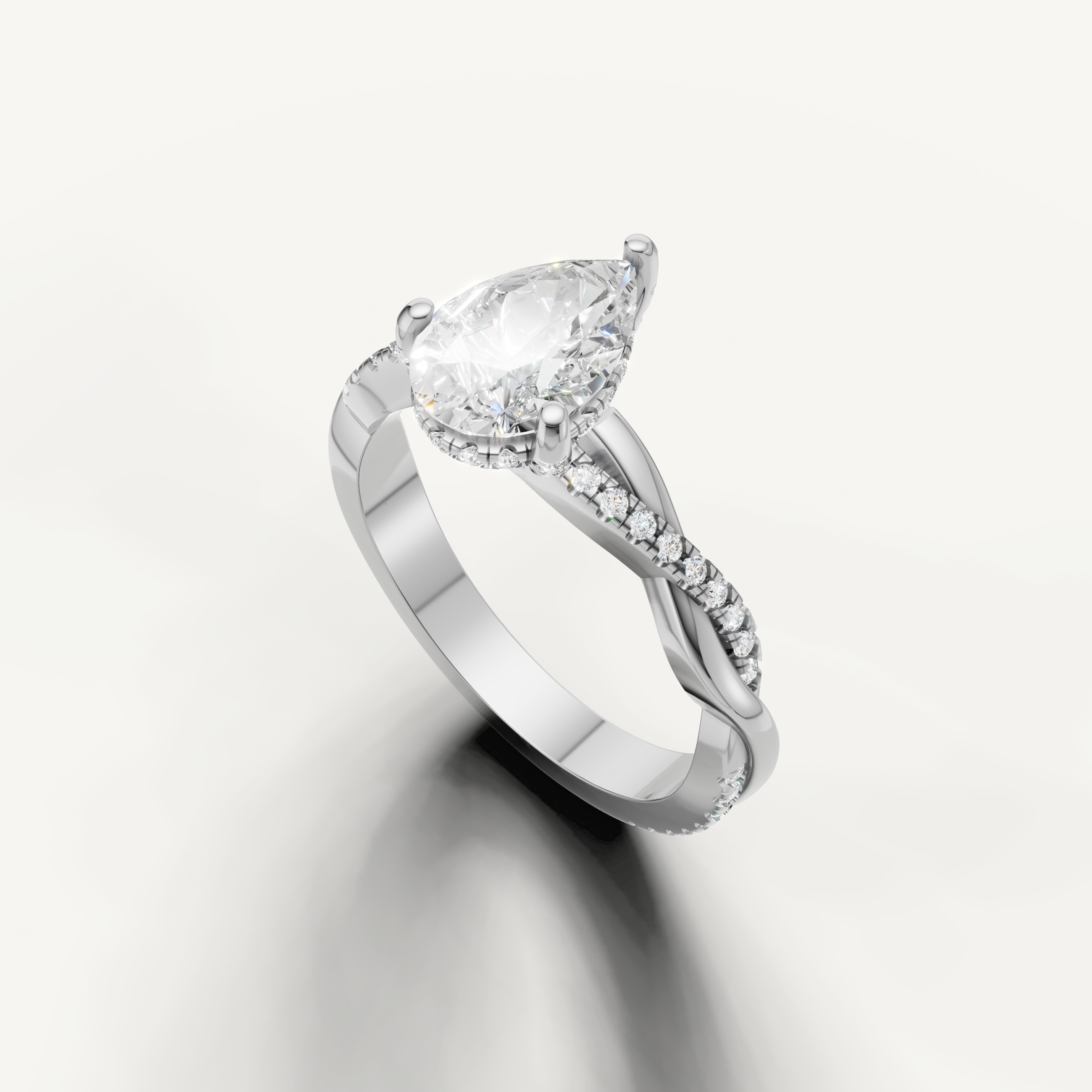 14k white gold pear cut lab grown diamond ring featuring a sleek crossover pavé setting