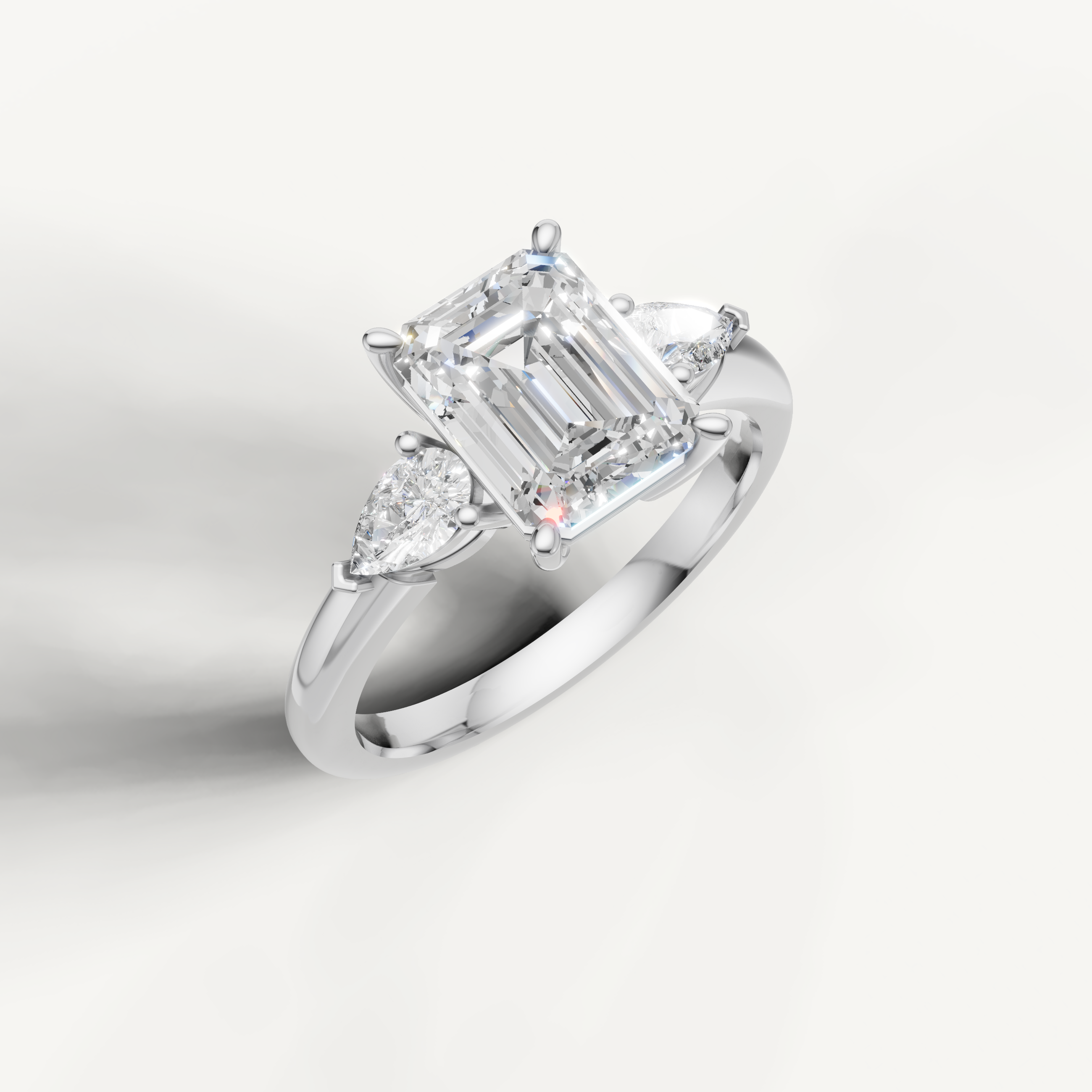 IGI certified emerald lab diamond three stone ring with marquise sides 14k white gold