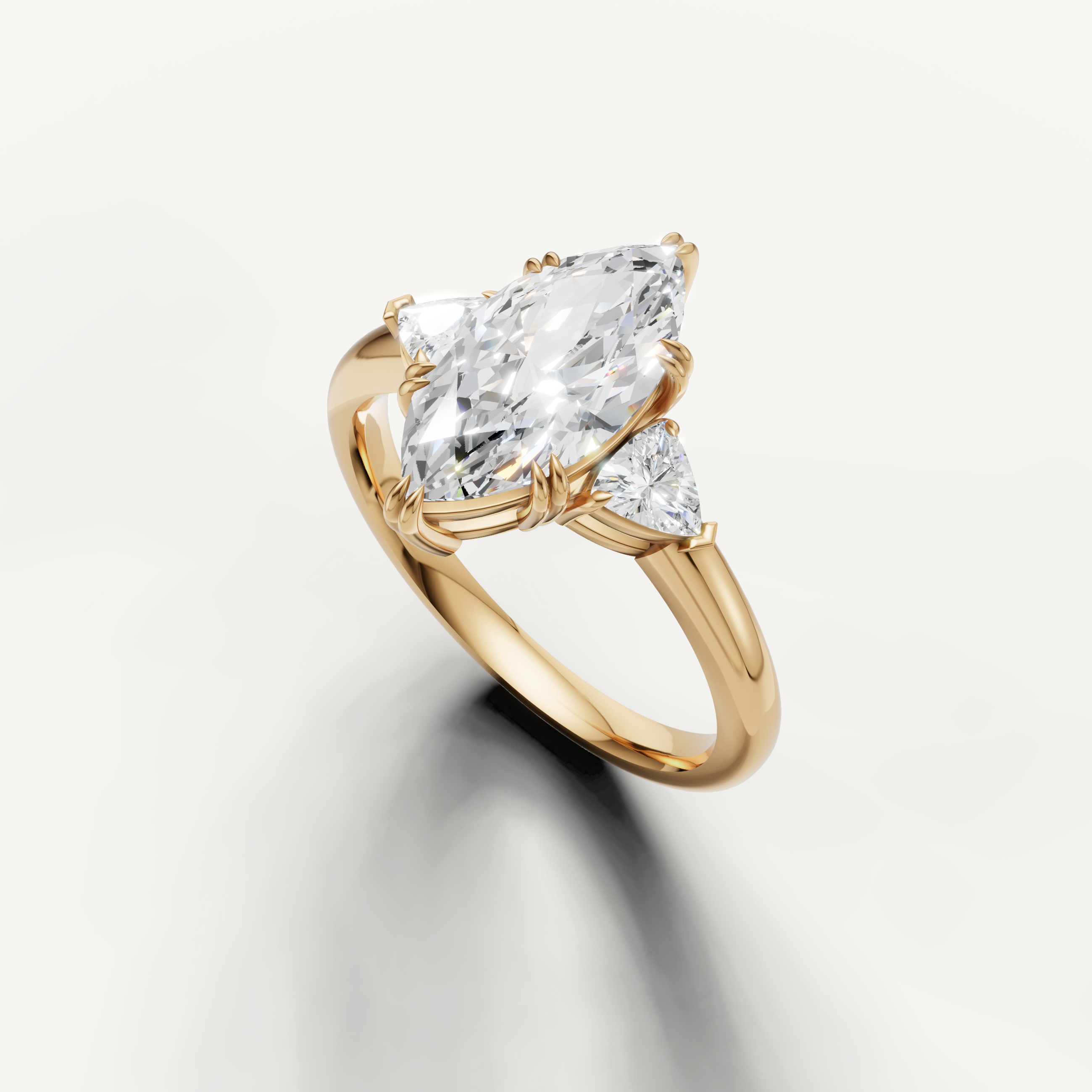 elegant marquise cut lab grown diamond ring with tapered trillion side diamonds