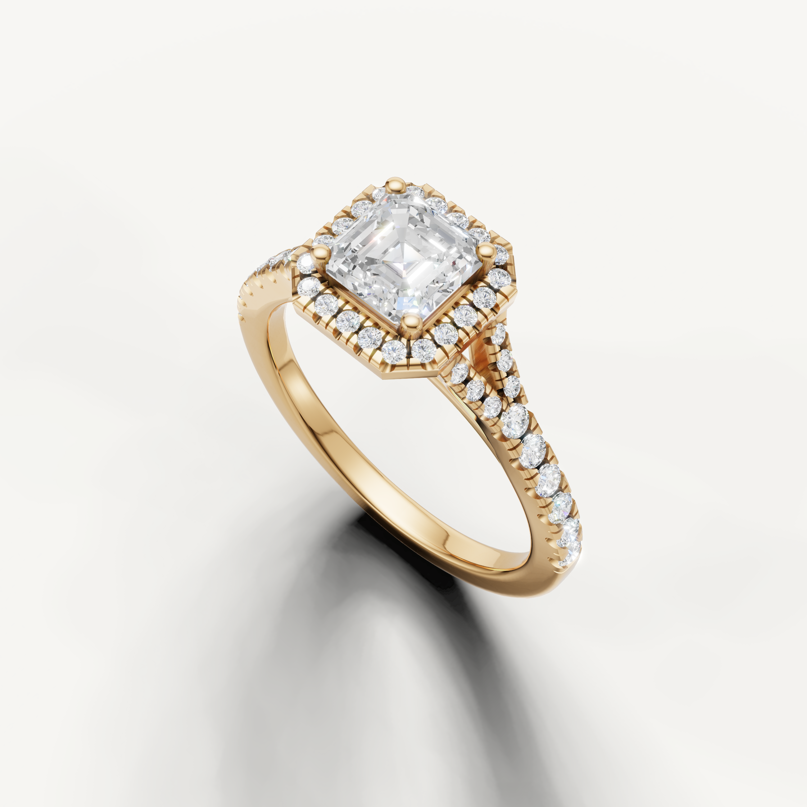 Vintage style asscher cut diamond halo ring with pavé band yellow gold