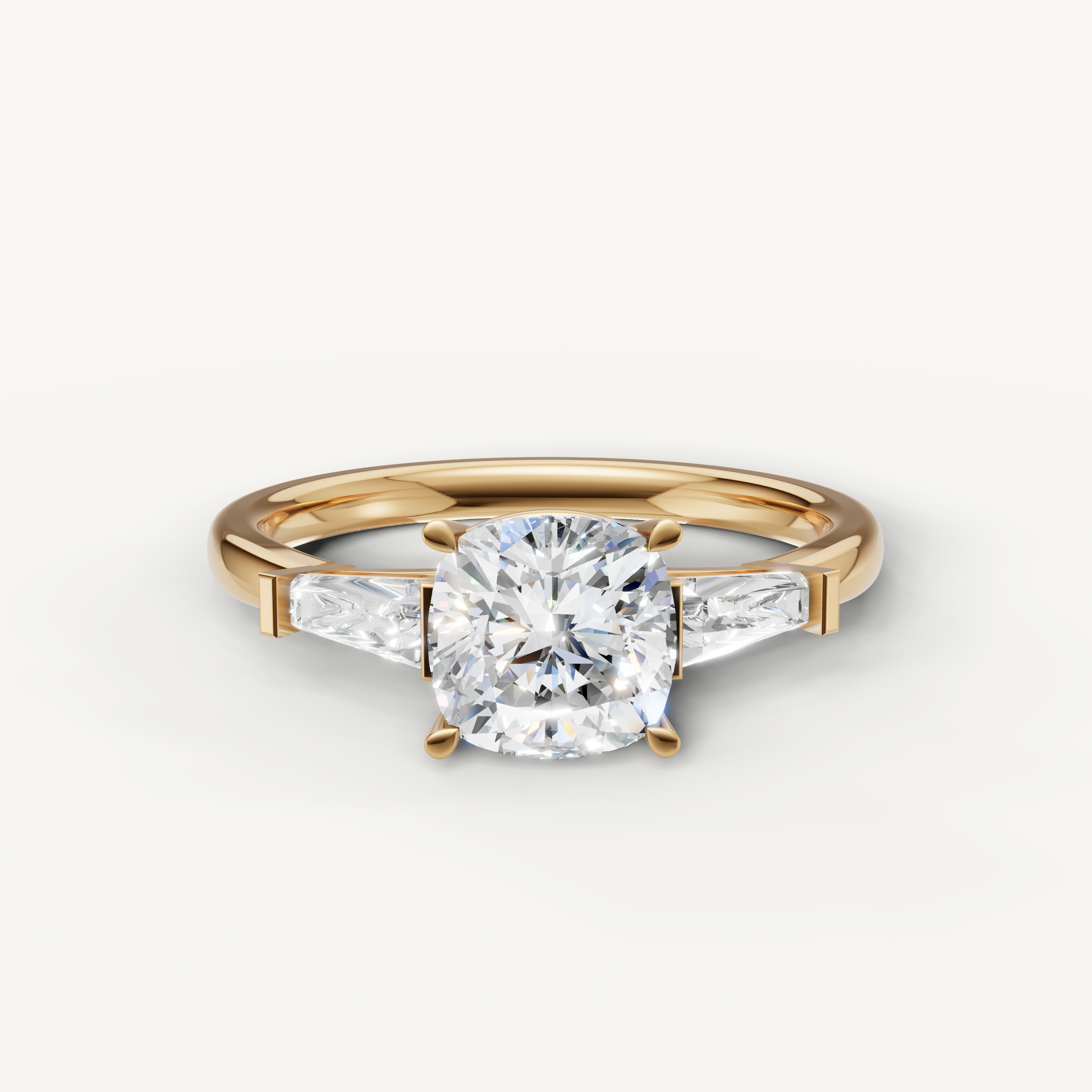 Cushion cut lab grown diamond ring with tapered baguette side stones yellow gold engagement ring