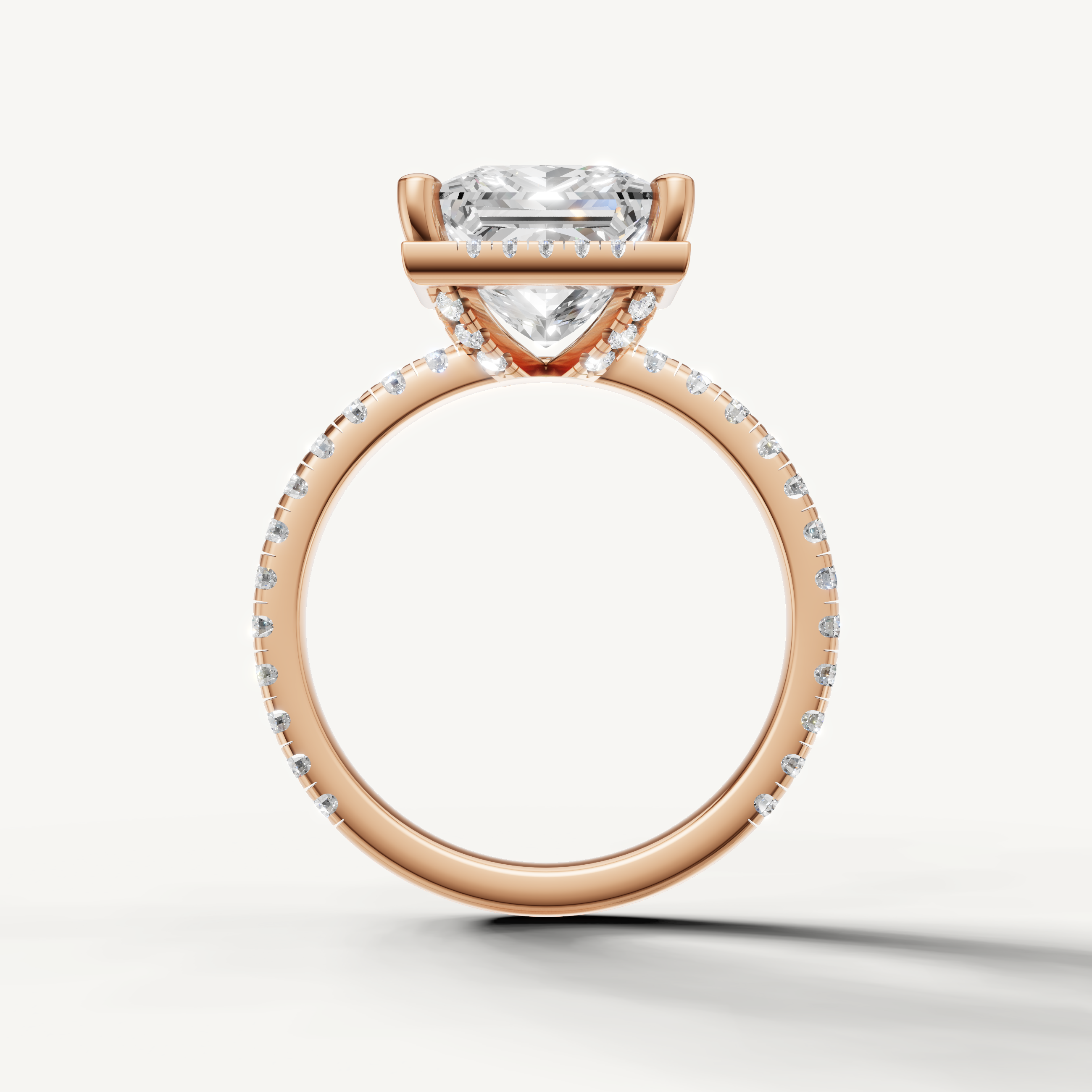 Princess shape diamond engagement ring with pavé band and hidden halo rose gold