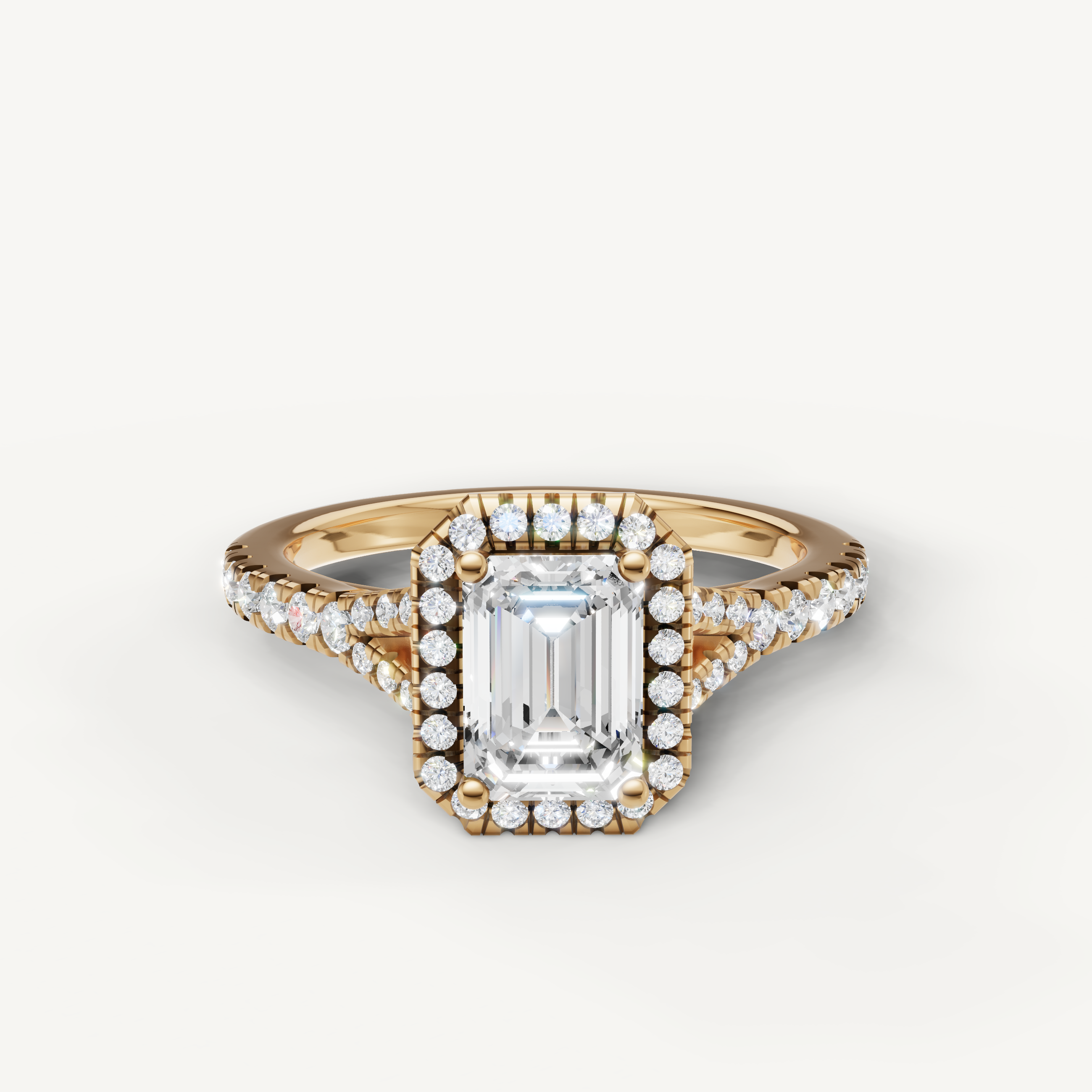 Emerald cut halo pavé lab grown diamond engagement ring in 14K yellow gold