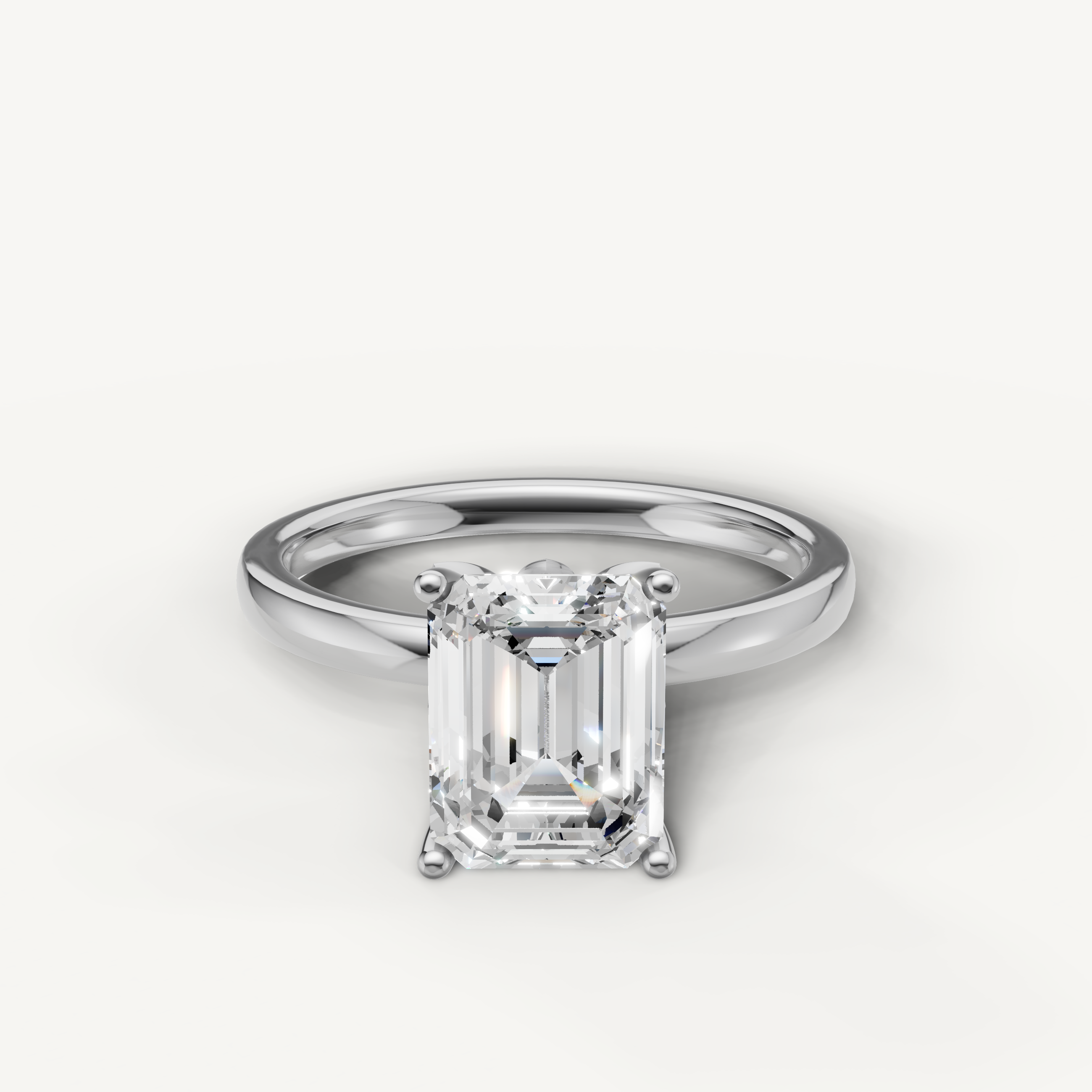 Emerald cut lab grown diamond solitaire engagement ring in white gold minimalist 4 prong setting