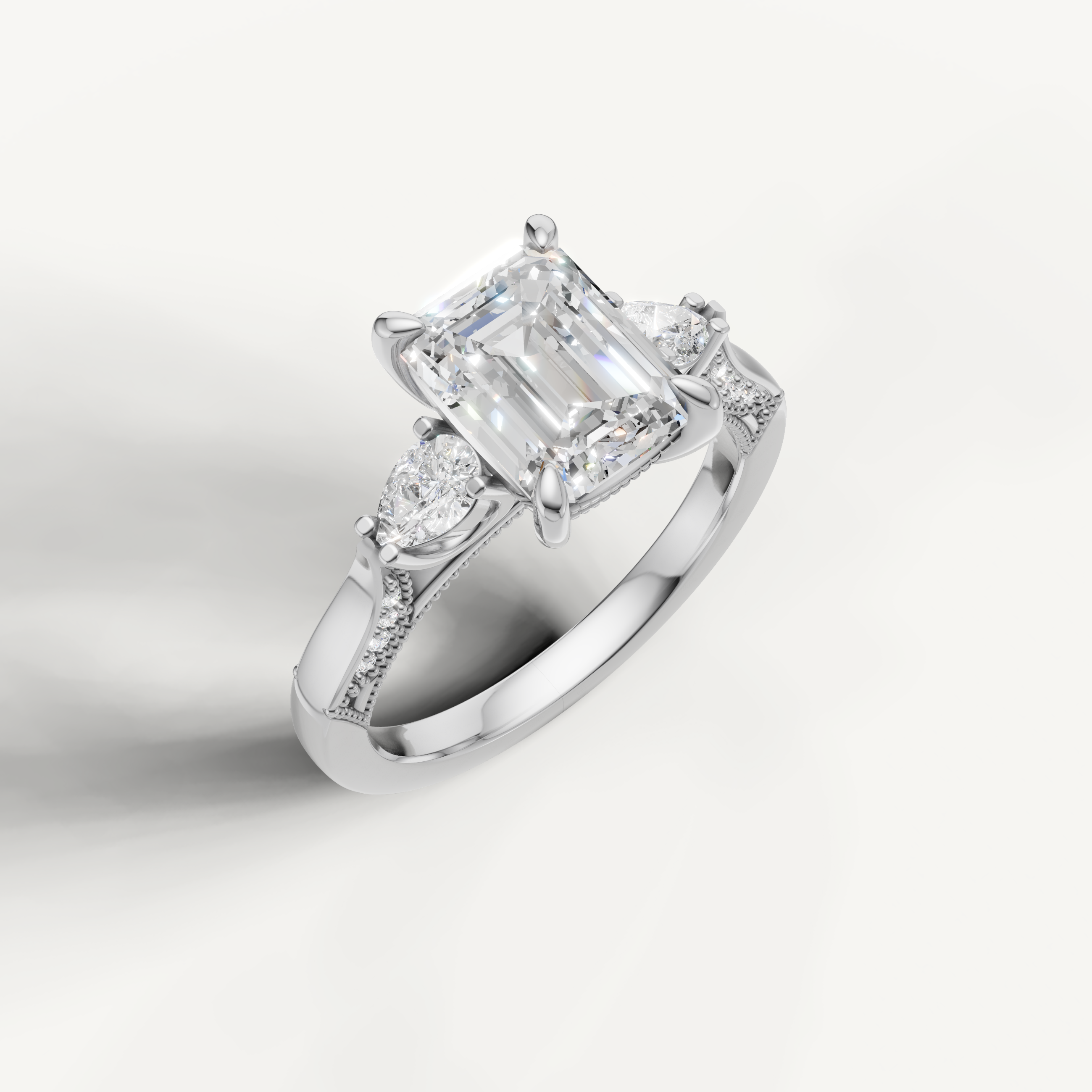 IGI certified emerald cut lab diamond ring with pear accents and pavé split band white gold