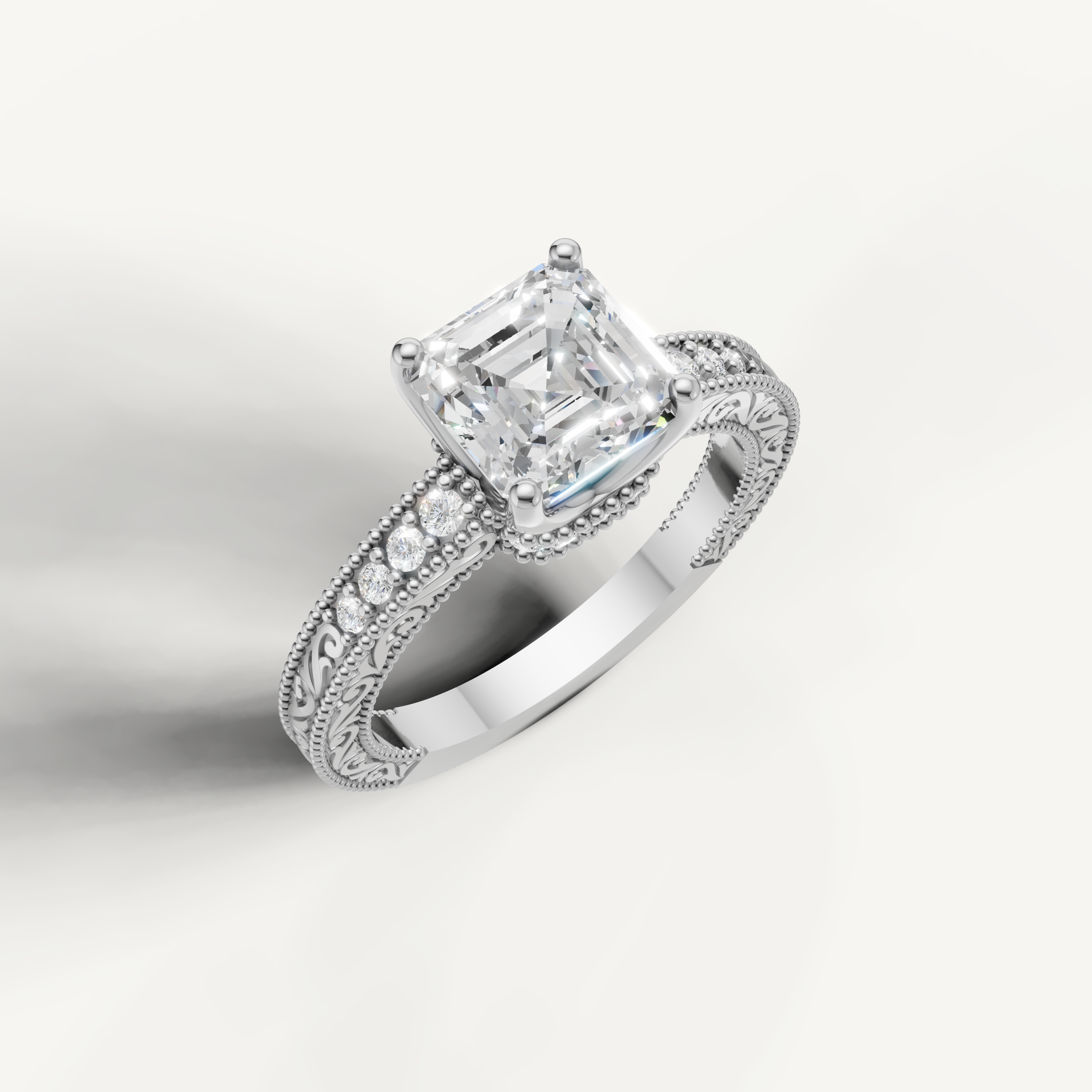 White gold Asscher cut lab grown diamond ring featuring antique-inspired scrollwork and milgrain detailing by Raul Diamonds.