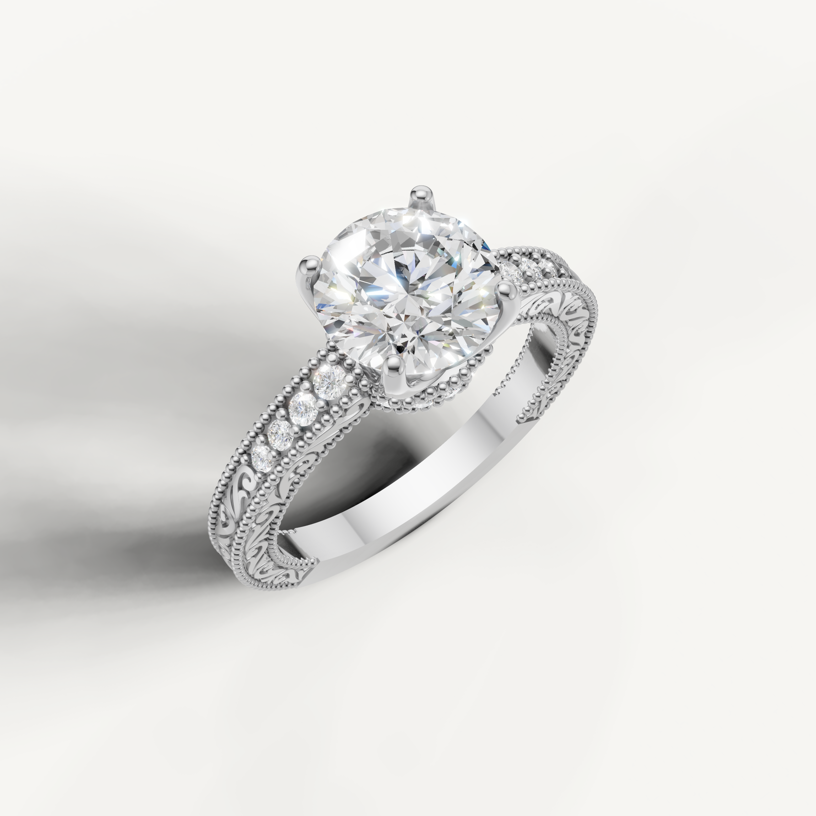 White gold round cut lab grown diamond ring featuring antique-style scrollwork and delicate craftsmanship by Raul Diamonds.