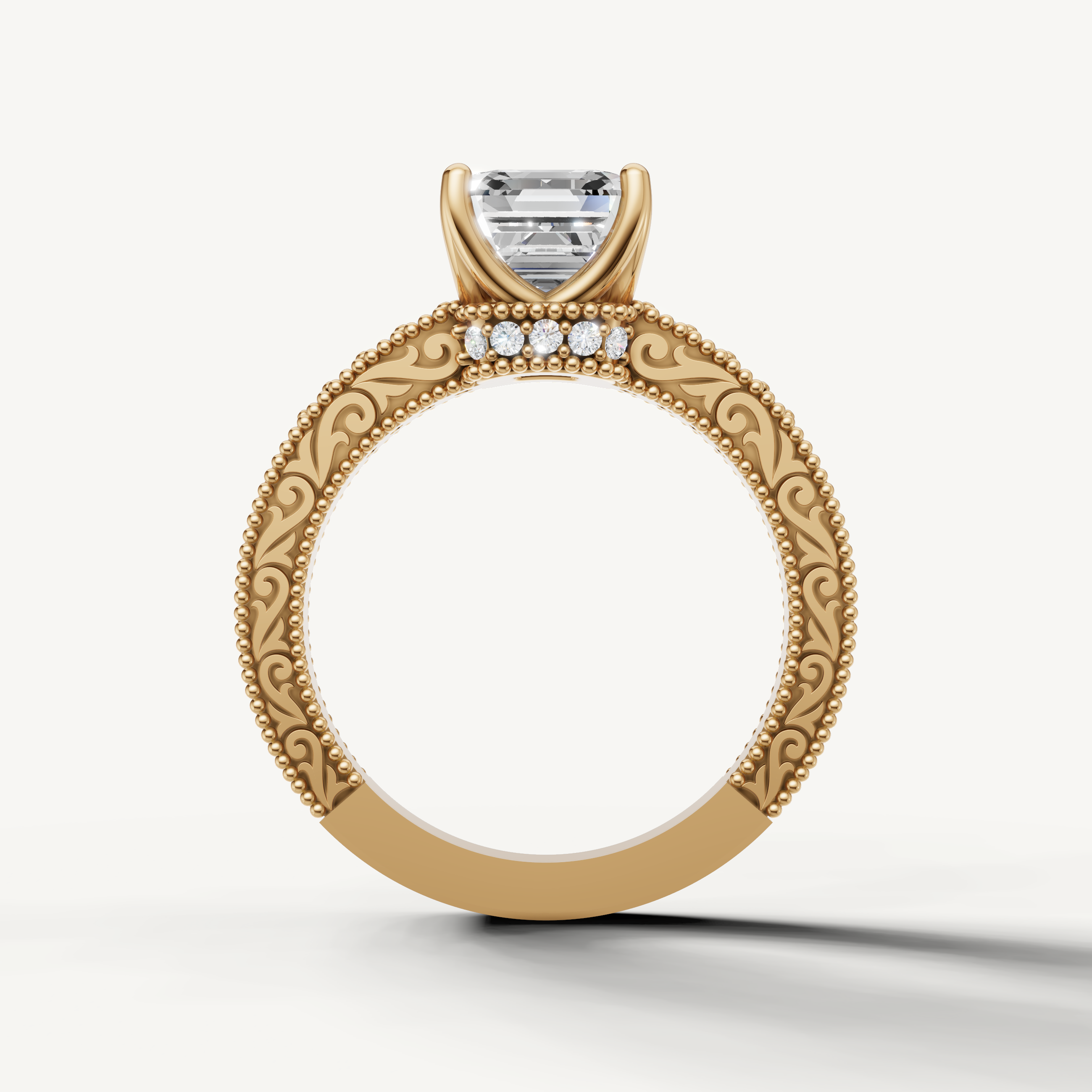 Antique-inspired Asscher cut lab grown diamond engagement ring in 14K yellow gold with floral filigree details by Raul Diamonds.