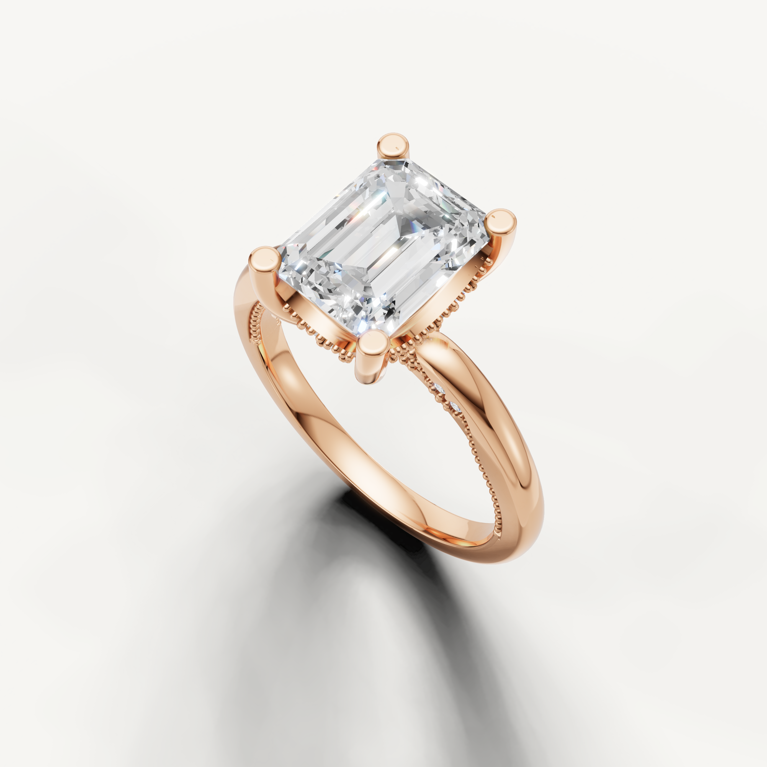 A smooth, minimalist rose gold band set with a radiant emerald-cut diamond, offering a unique and warm aesthetic.