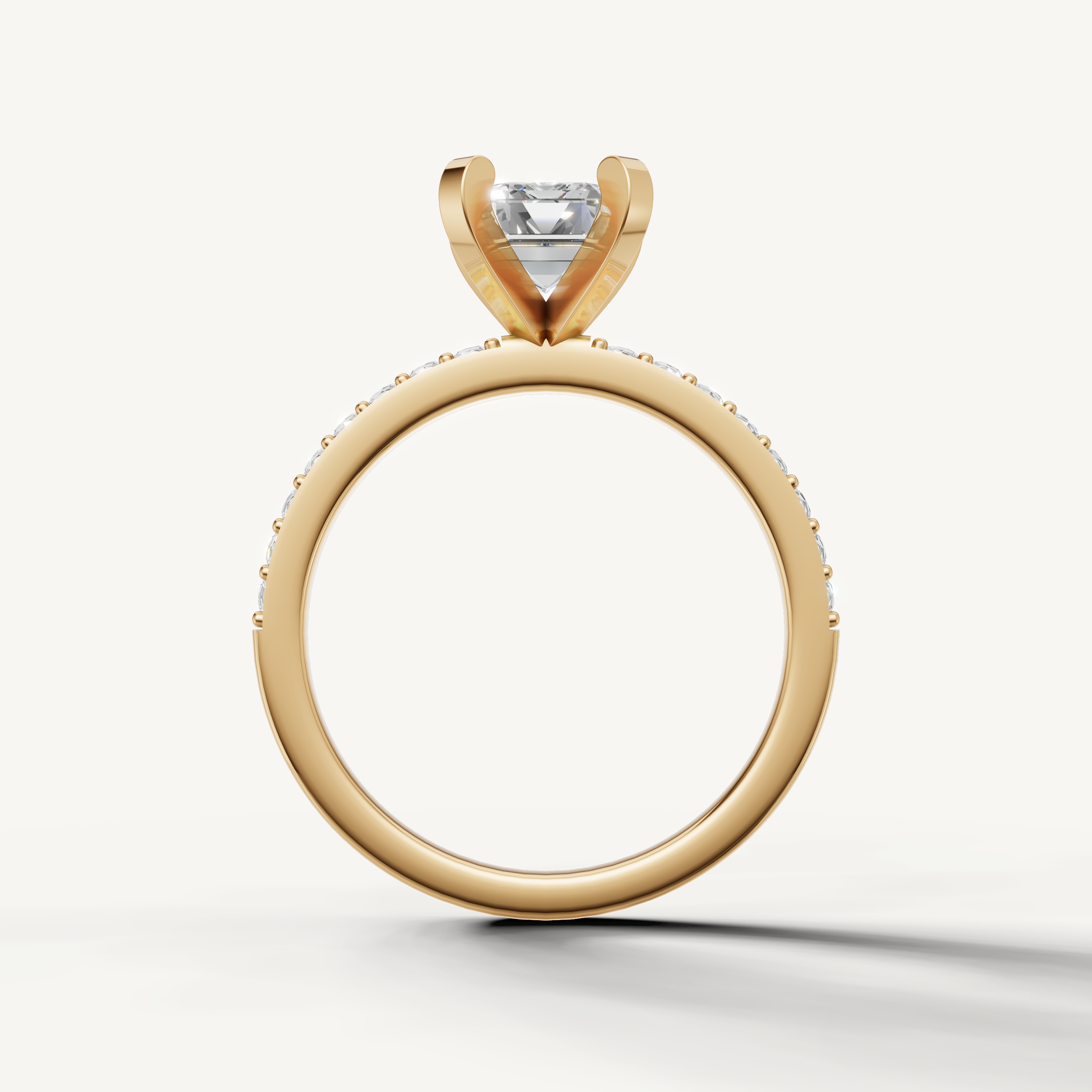 Emerald cut lab grown diamond ring in yellow gold slim pavé band elegant setting