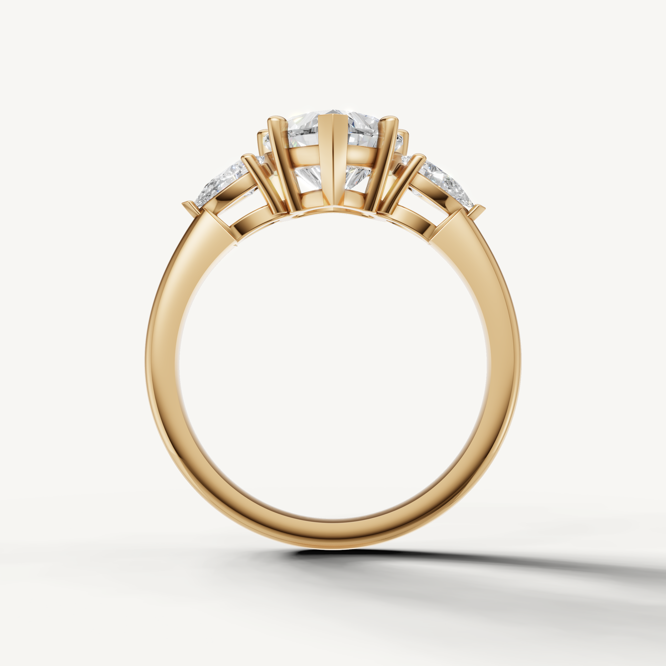 heart shaped lab grown diamond ring with pear accents yellow gold