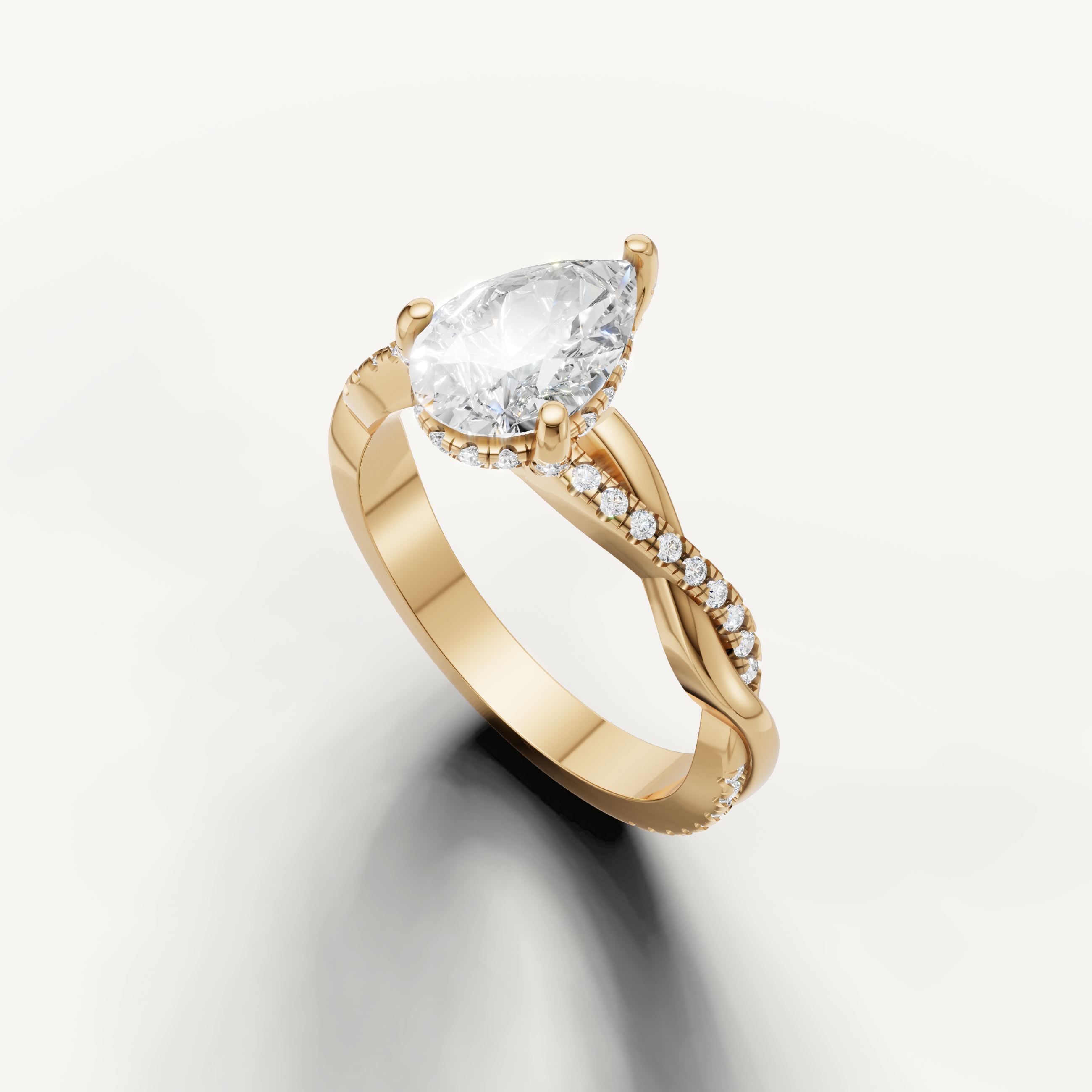 14k yellow gold pear cut lab grown diamond ring featuring a modern bypass pavé design