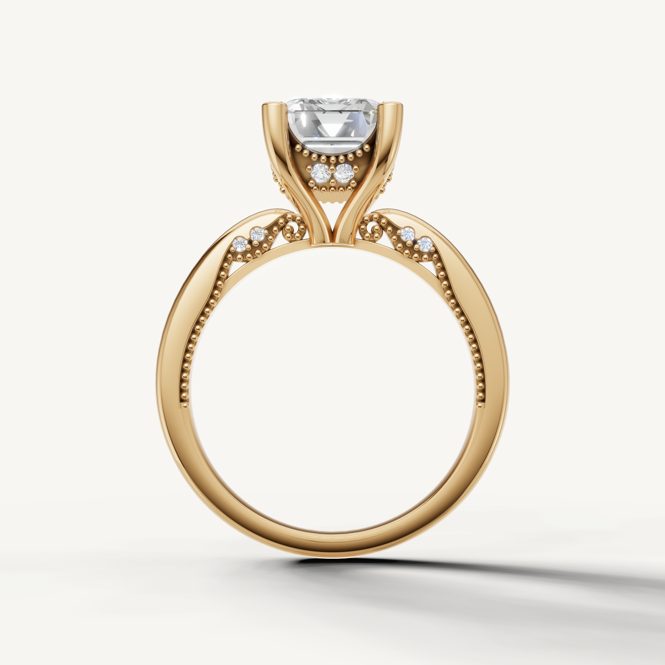 A sleek, contemporary yellow gold solitaire ring that places focus on the large, sparkling emerald-cut center diamond.