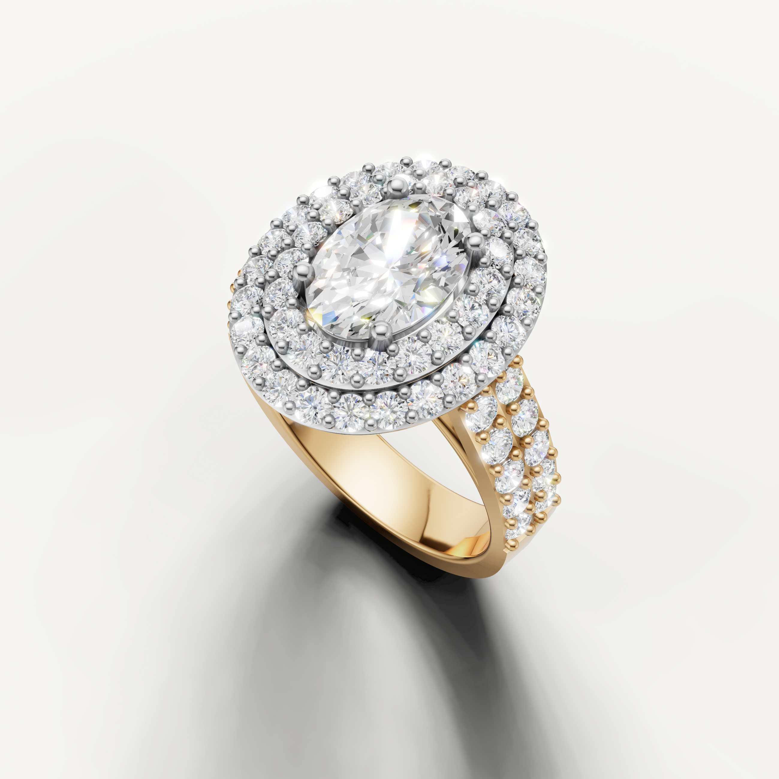 Oval diamond engagement ring with sparkling halo setting from Raul Diamonds