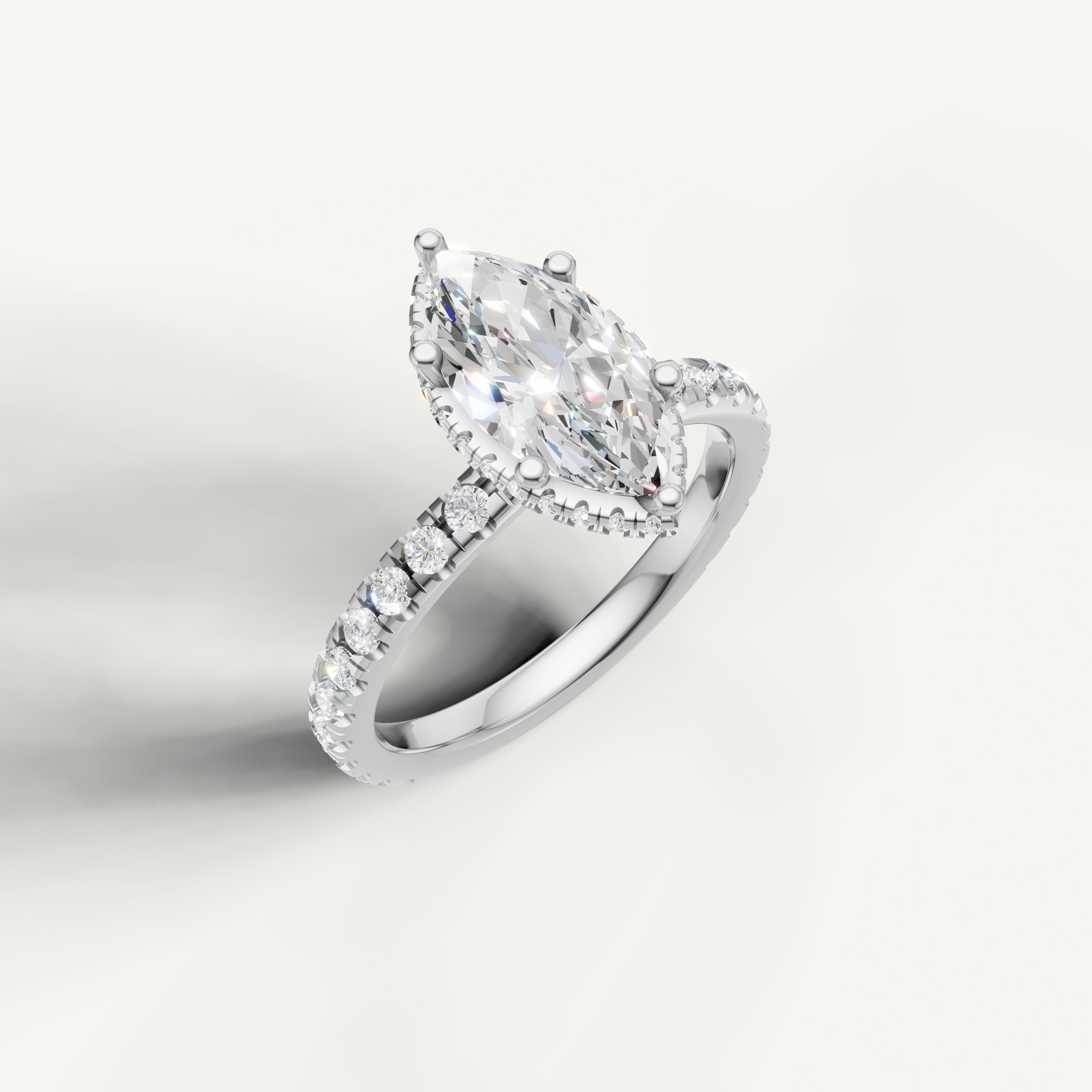 elegant marquise solitaire engagement ring with shimmering pavé diamonds