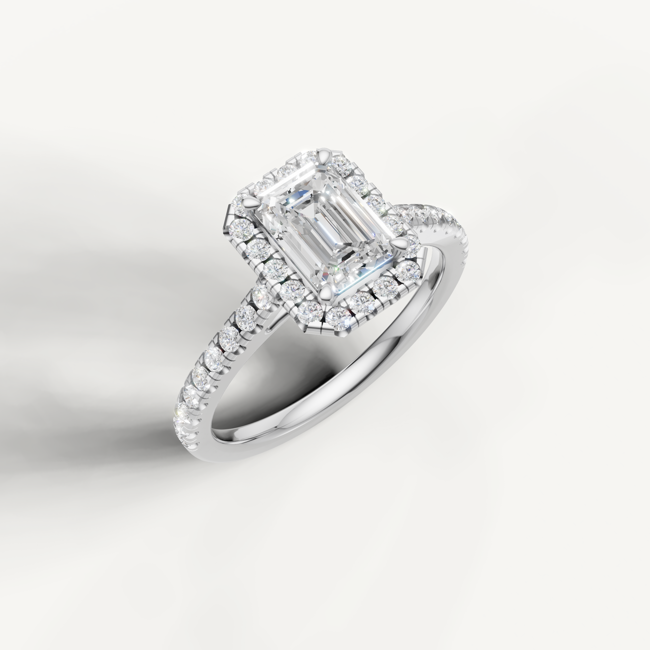 classic emerald cut lab grown diamond halo ring with shimmering pavé diamonds