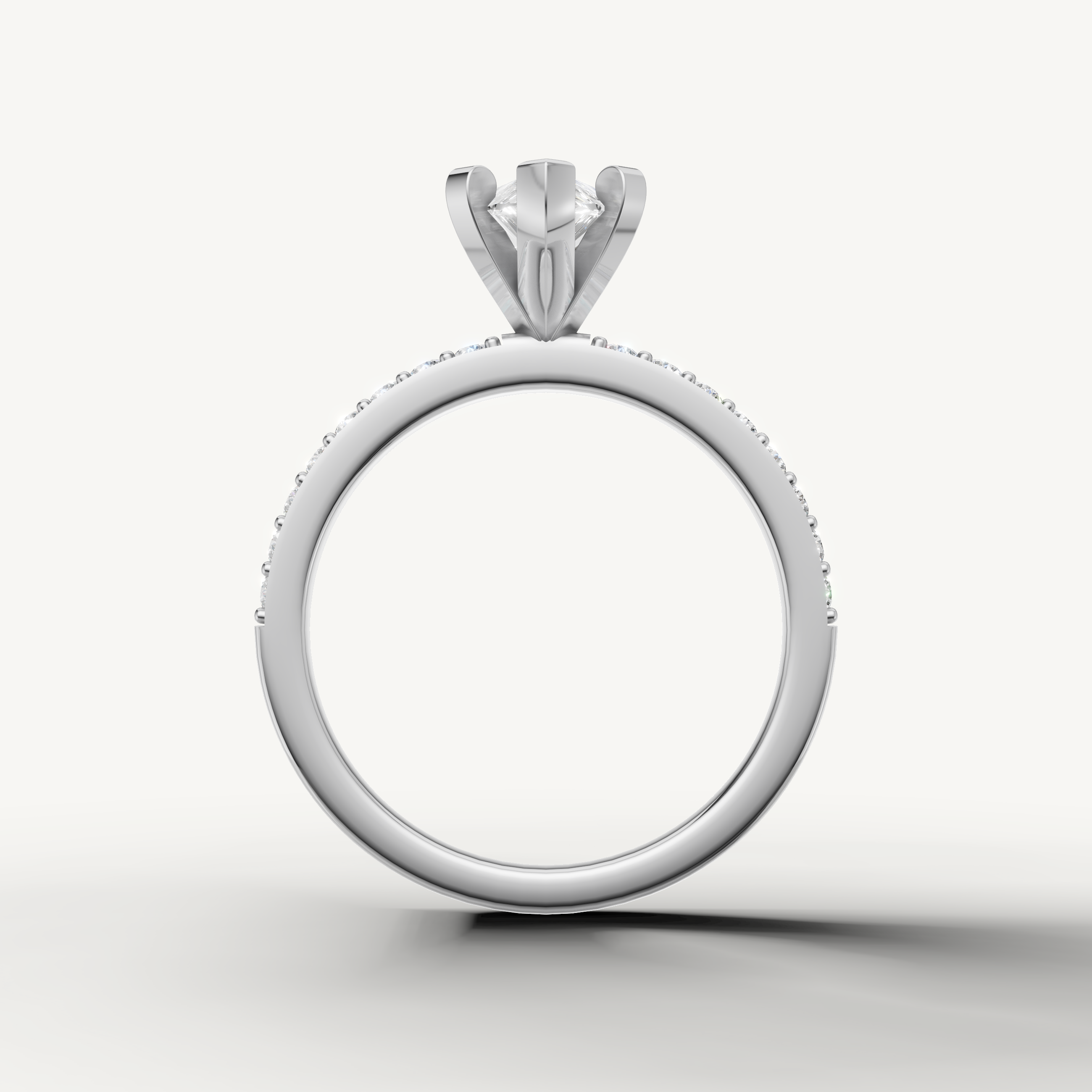 timeless pear shaped diamond engagement ring with slim pavé band