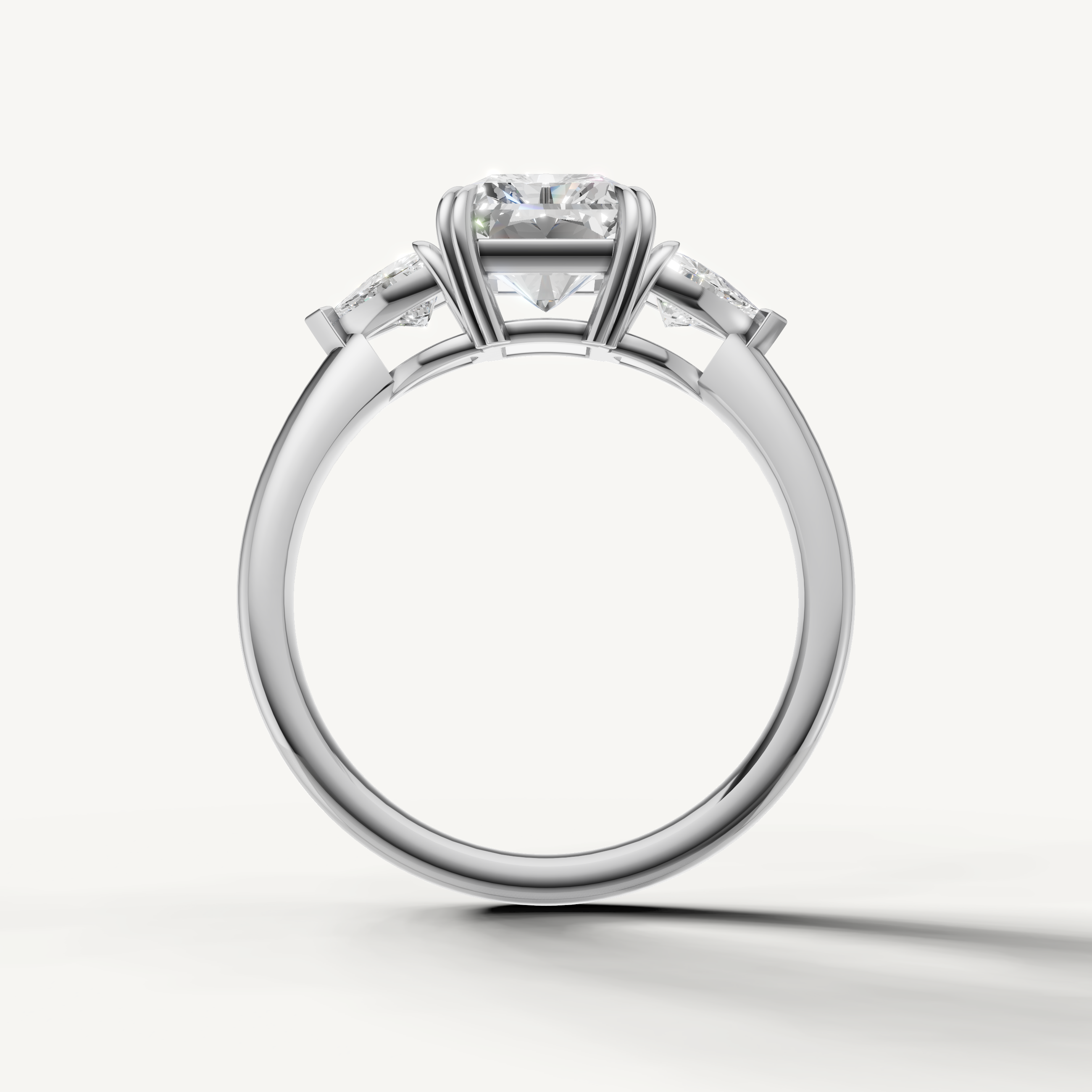 timeless radiant cut lab grown diamond ring with tapered trillion side stones