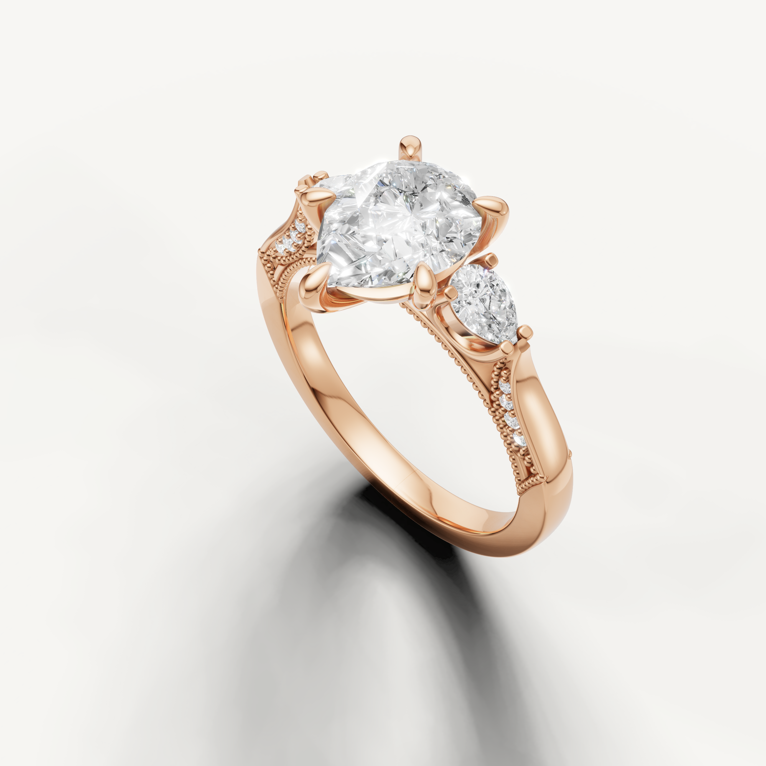 Pear shape lab grown diamond engagement ring with pear side diamonds rose gold modern elegance